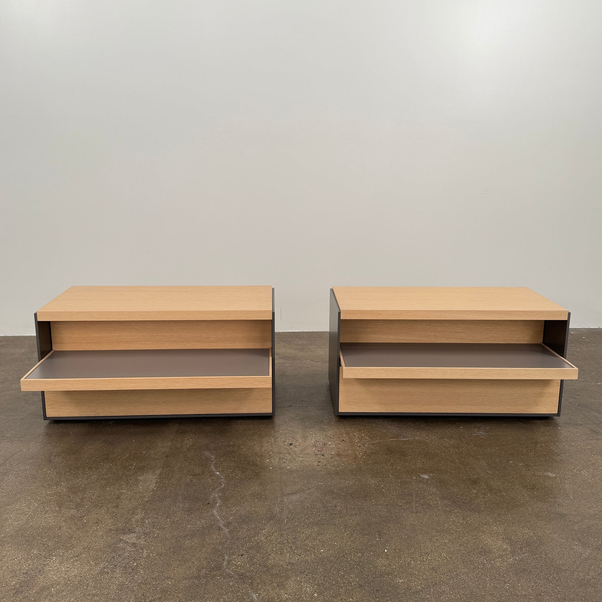 Set of 2 B&B Italia Surface Chest of Drawers with pull-out shelves, featuring light wood tops, open shelves, and lower drawers, displayed against a plain white background.
