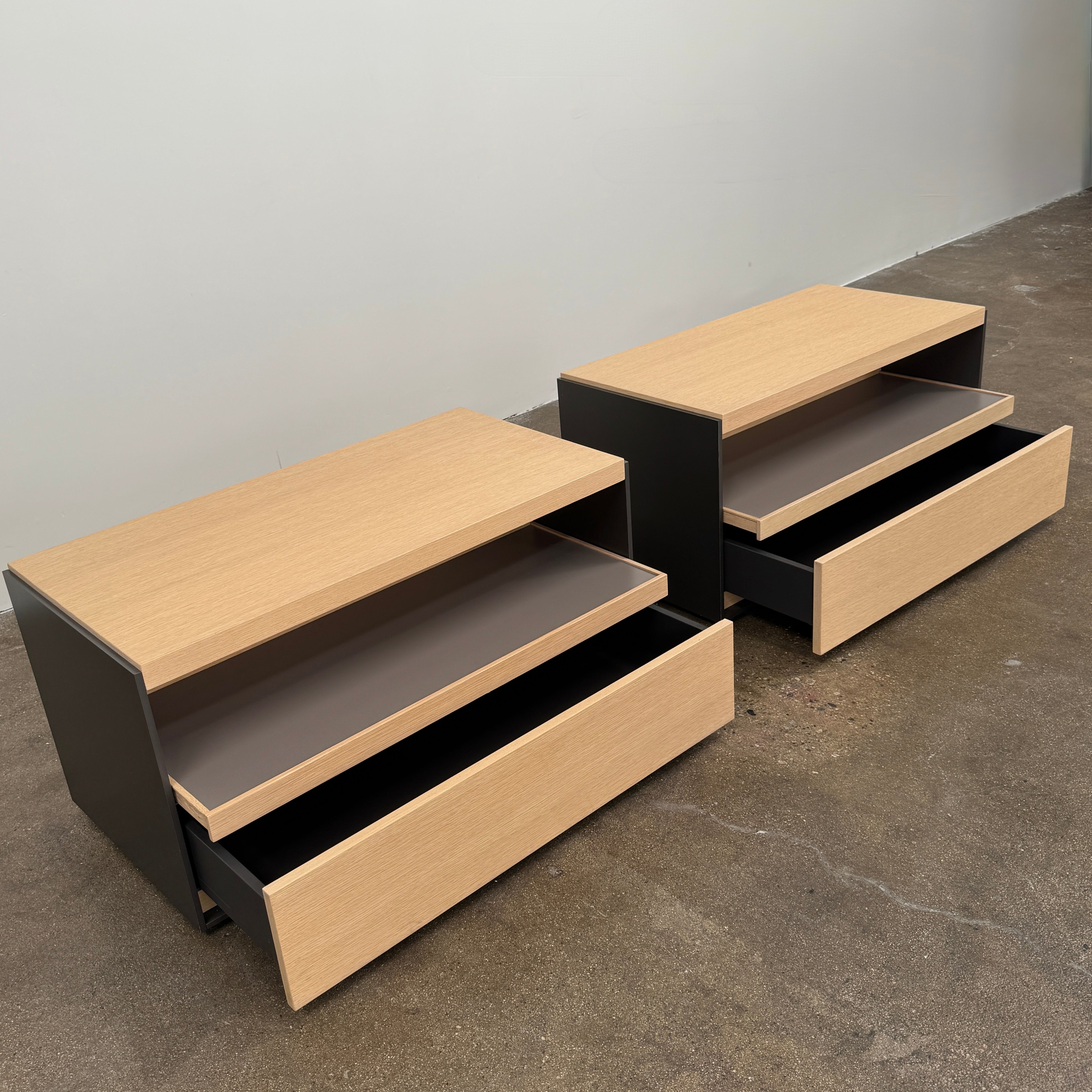 Set of 2 B&B Italia Surface Chest of Drawers with pull-out shelves, featuring light wood tops, open shelves, and lower drawers, displayed against a plain white background.