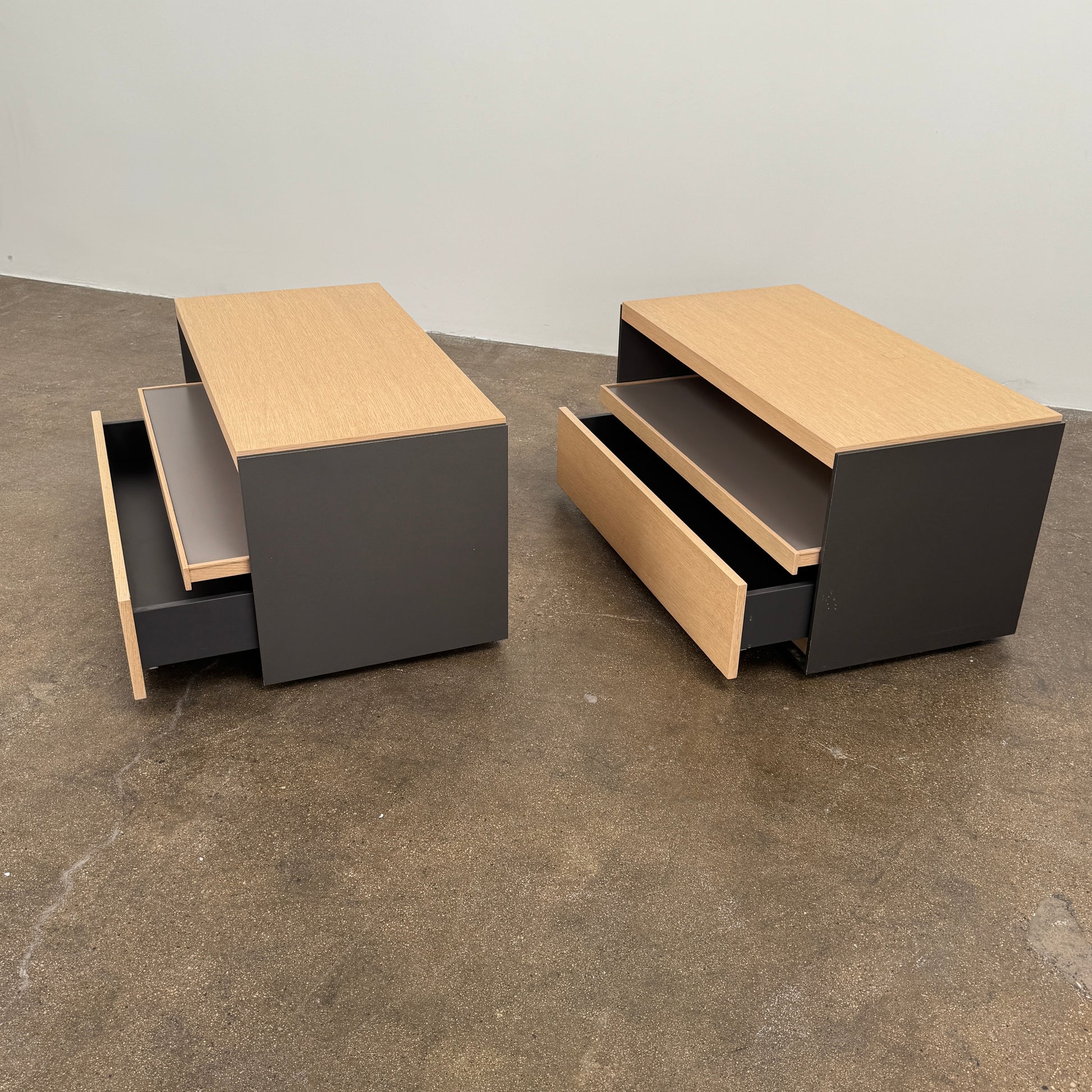 Set of 2 B&B Italia Surface Chest of Drawers with pull-out shelves, featuring light wood tops, open shelves, and lower drawers, displayed against a plain white background.