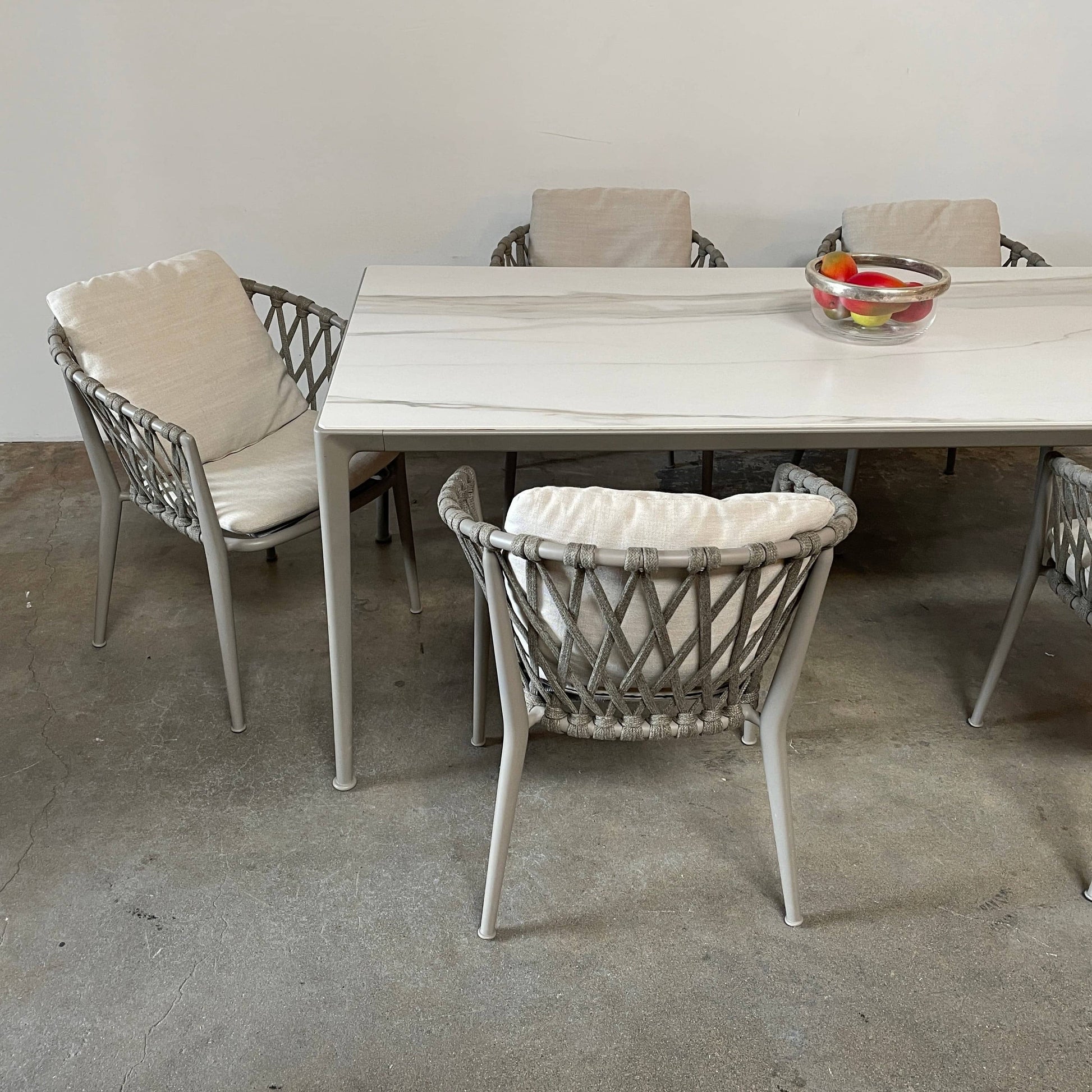 An elegant simplicity with a B&B Italia Mirto Outdoor Dining Table on a white background.