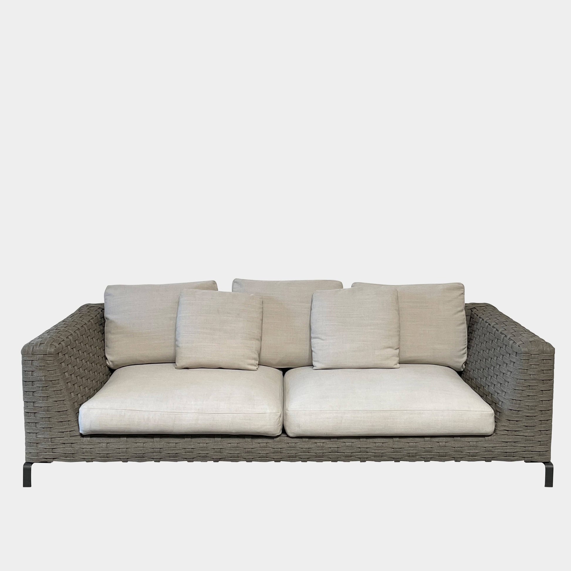 A B&B Italia Ray Outdoor Sofas with cushions on a white background.