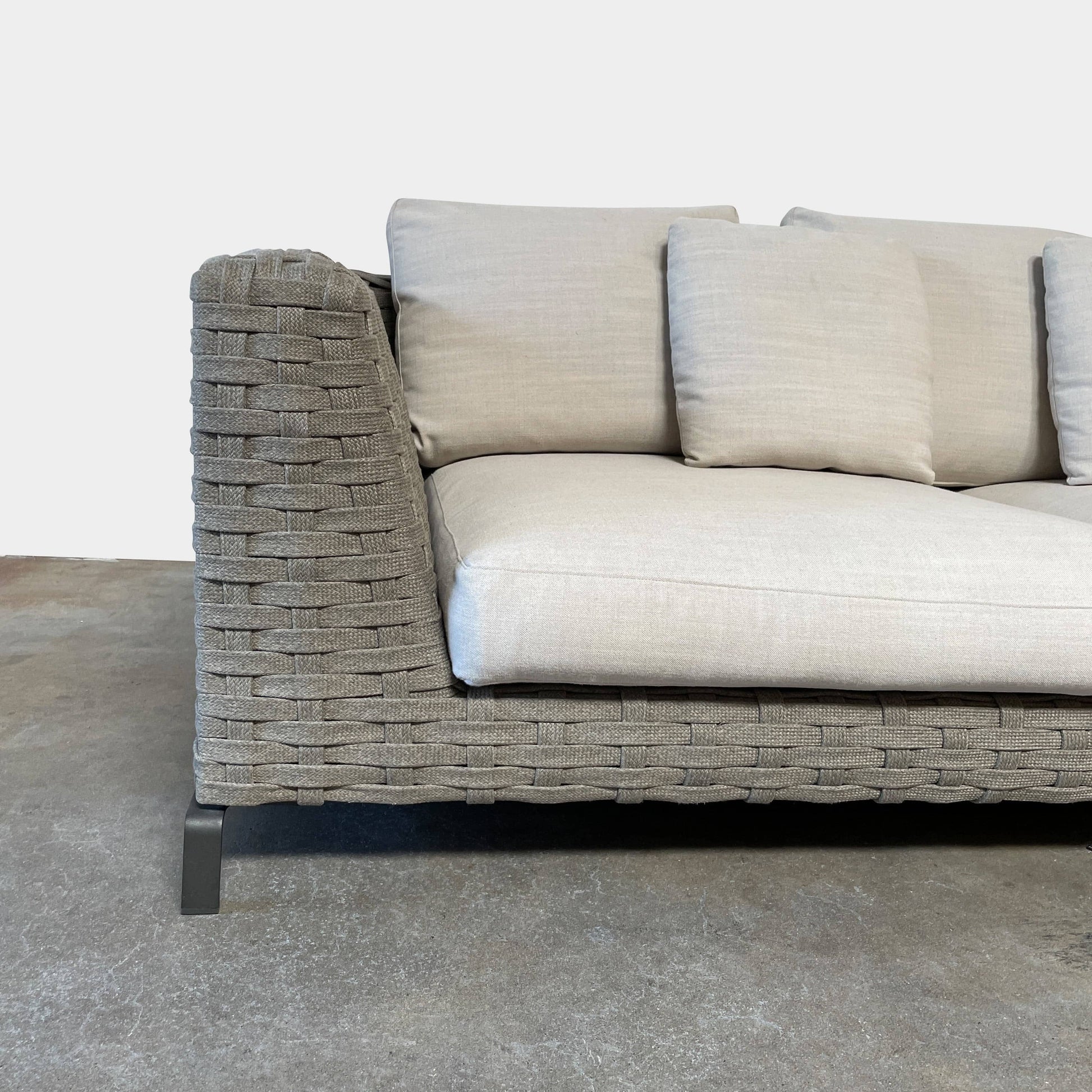 A B&B Italia Ray Outdoor Sofas with cushions on a white background.