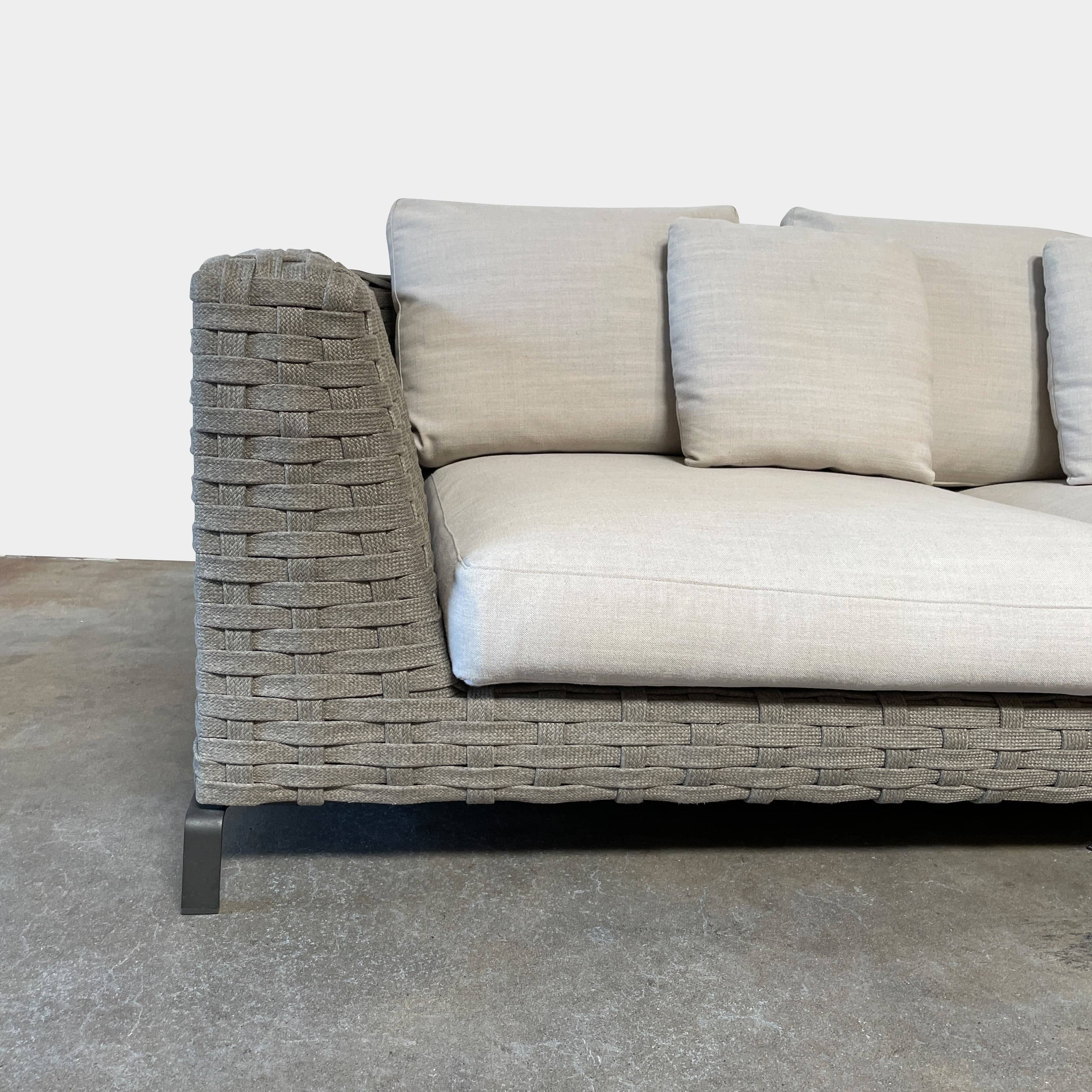 A B&B Italia Ray Outdoor Sofas with cushions on a white background.