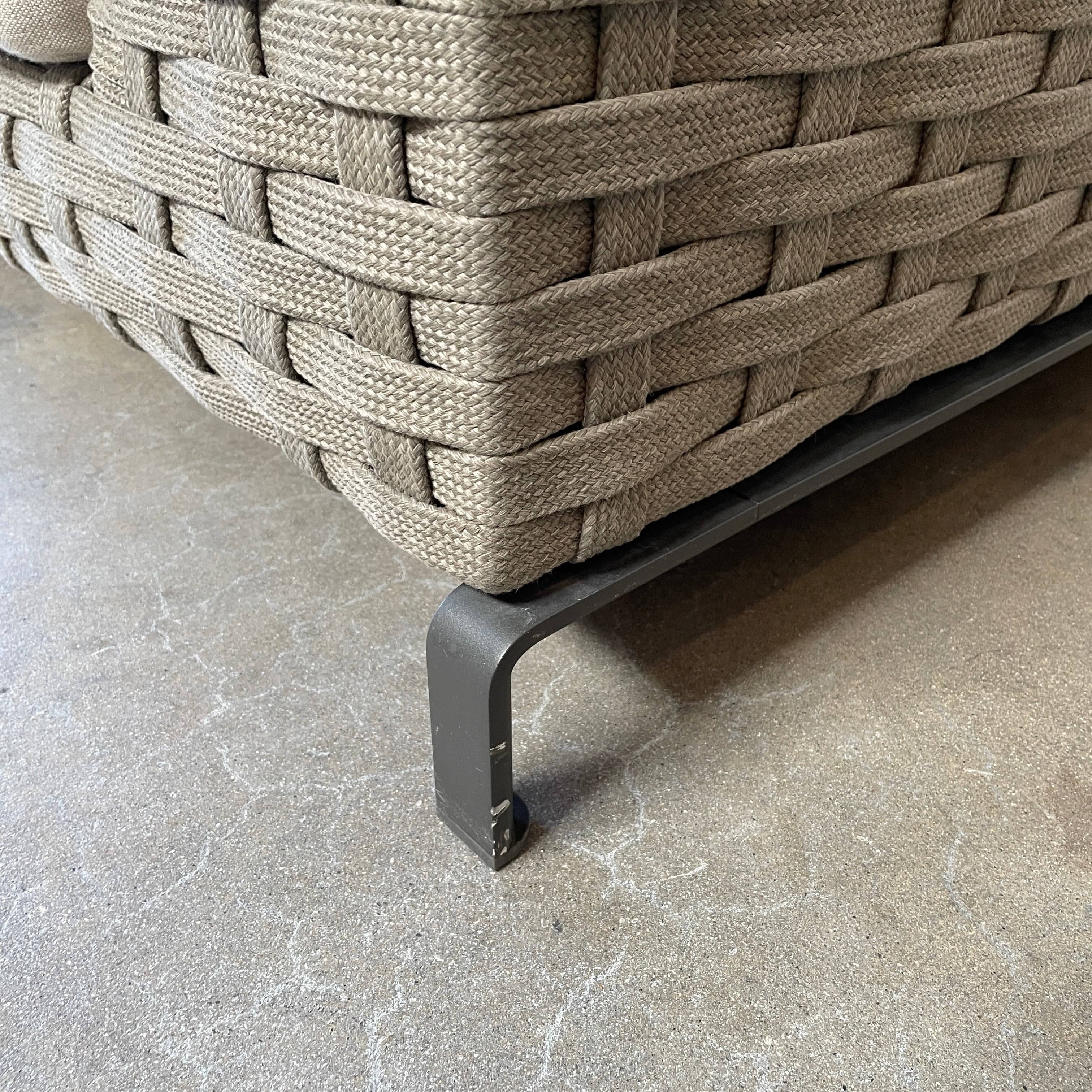 A B&B Italia Ray Outdoor Sofas with cushions on a white background.