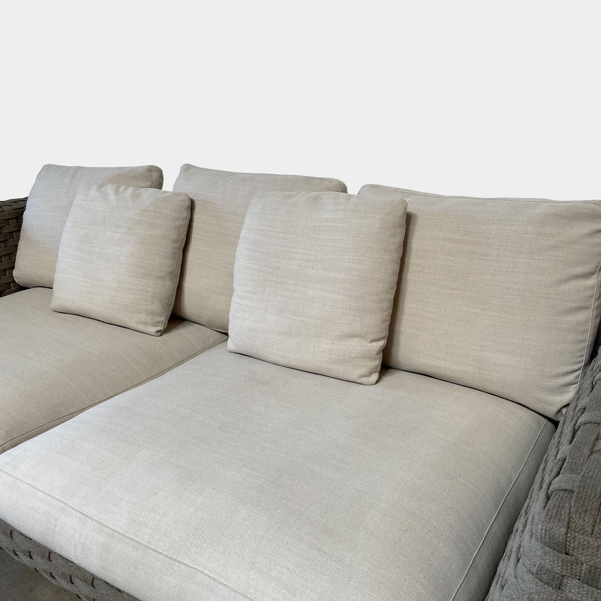 A B&B Italia Ray Outdoor Sofas with cushions on a white background.