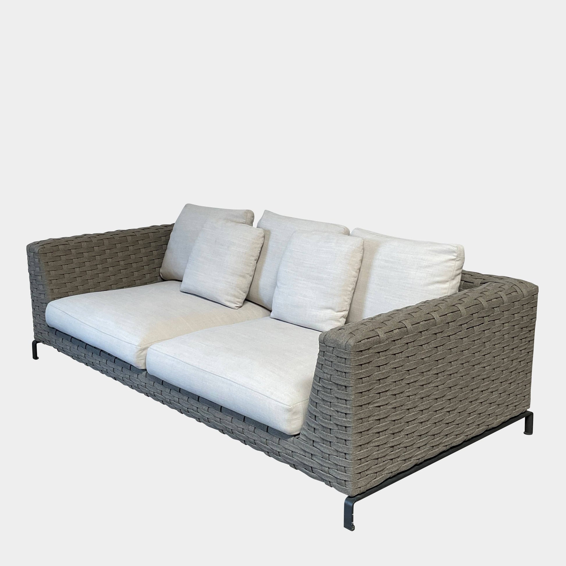 A B&B Italia Ray Outdoor Sofas with cushions on a white background.
