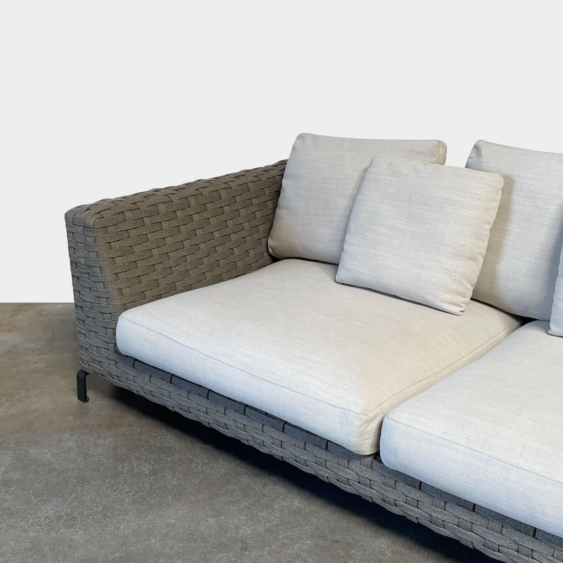 A B&B Italia Ray Outdoor Sofas with cushions on a white background.
