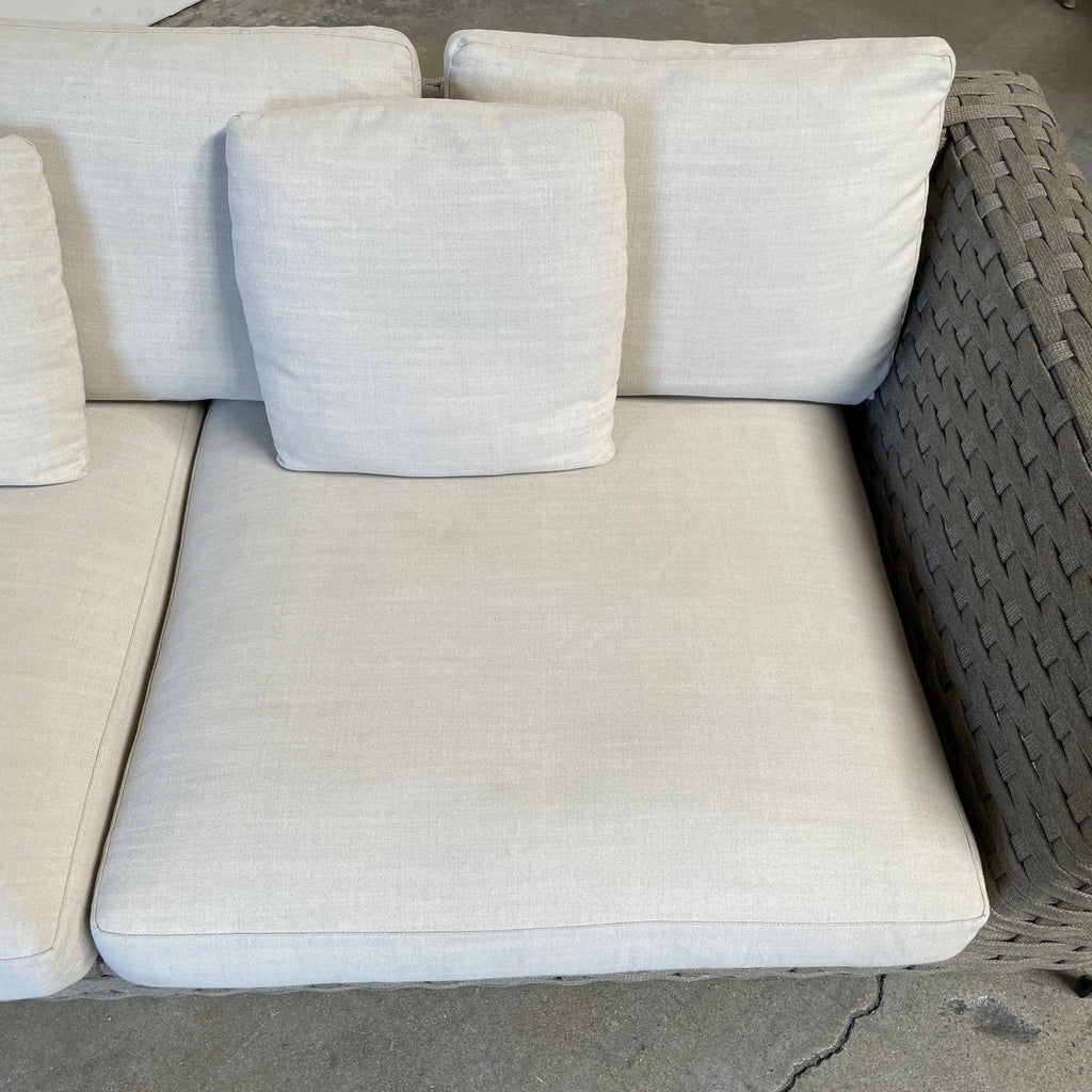A B&B Italia Ray Outdoor Sofas with cushions on a white background.