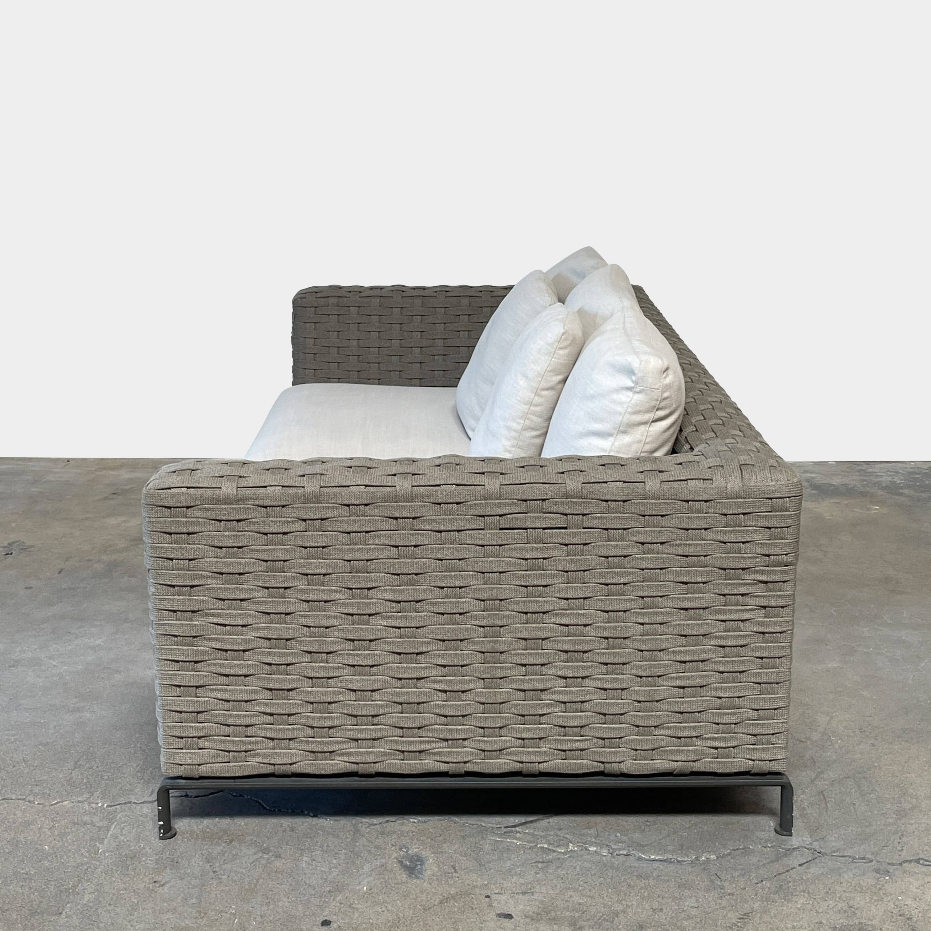 A B&B Italia Ray Outdoor Sofas with cushions on a white background.