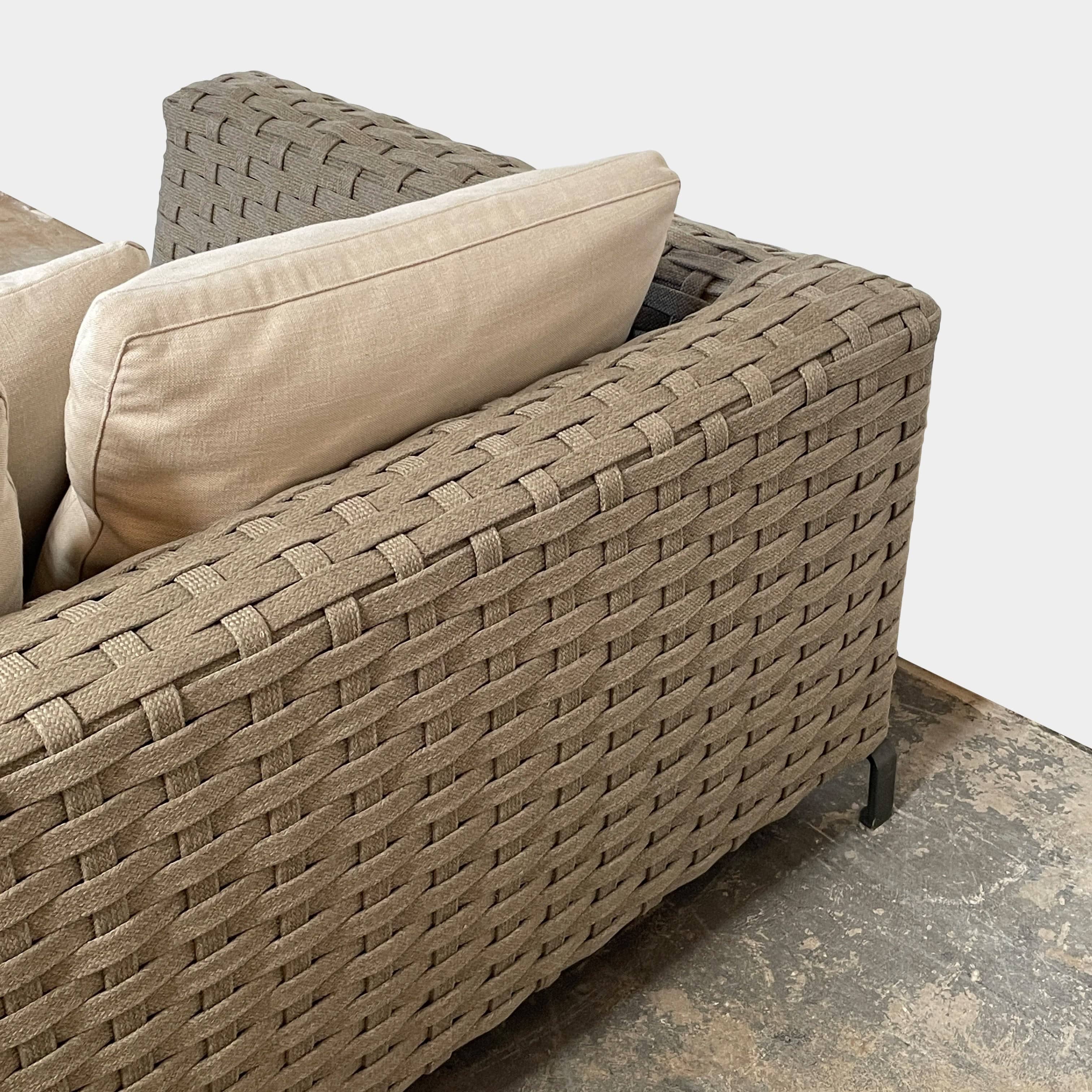 A B&B Italia Ray Outdoor Sofas with cushions on a white background.