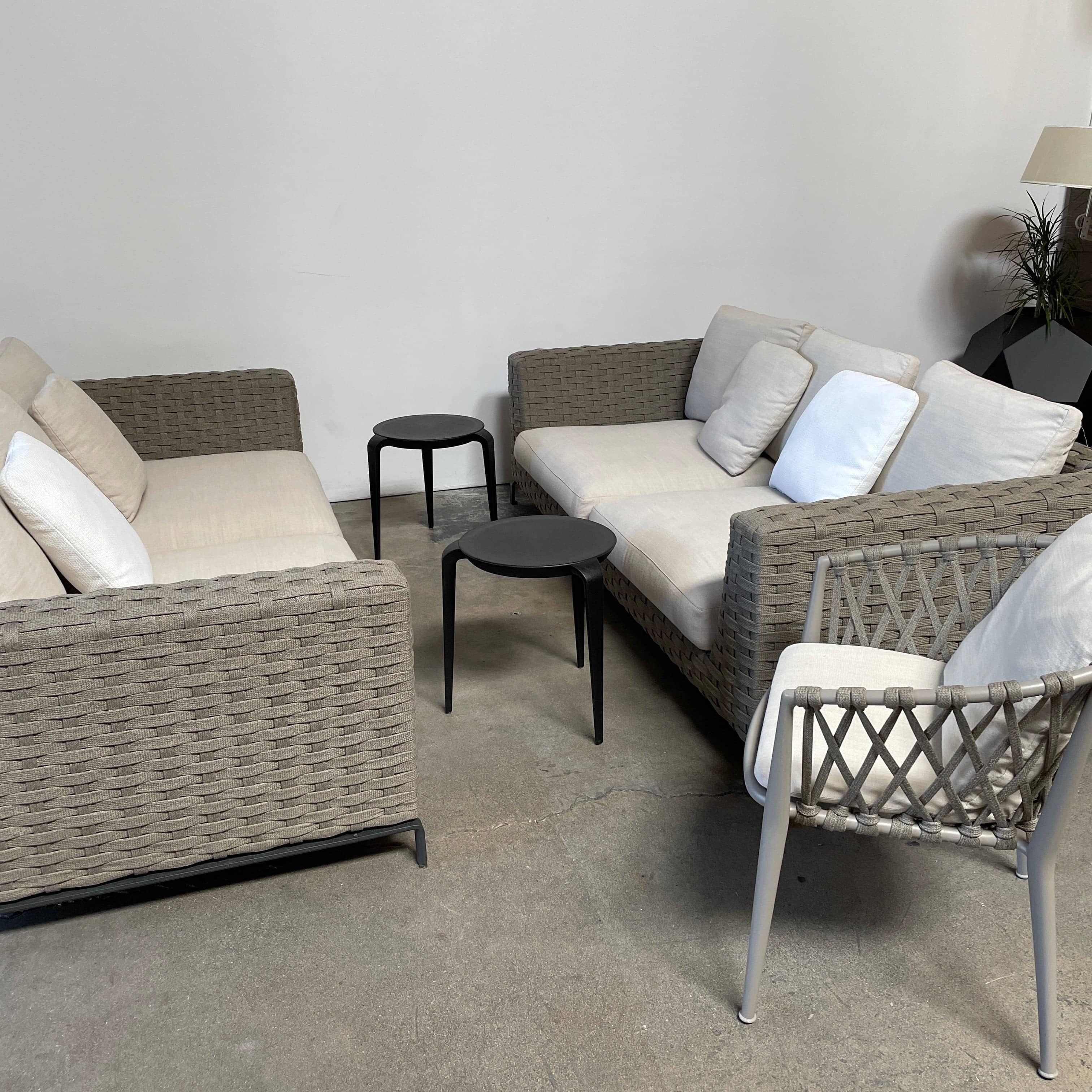 A B&B Italia Ray Outdoor Sofas with cushions on a white background.