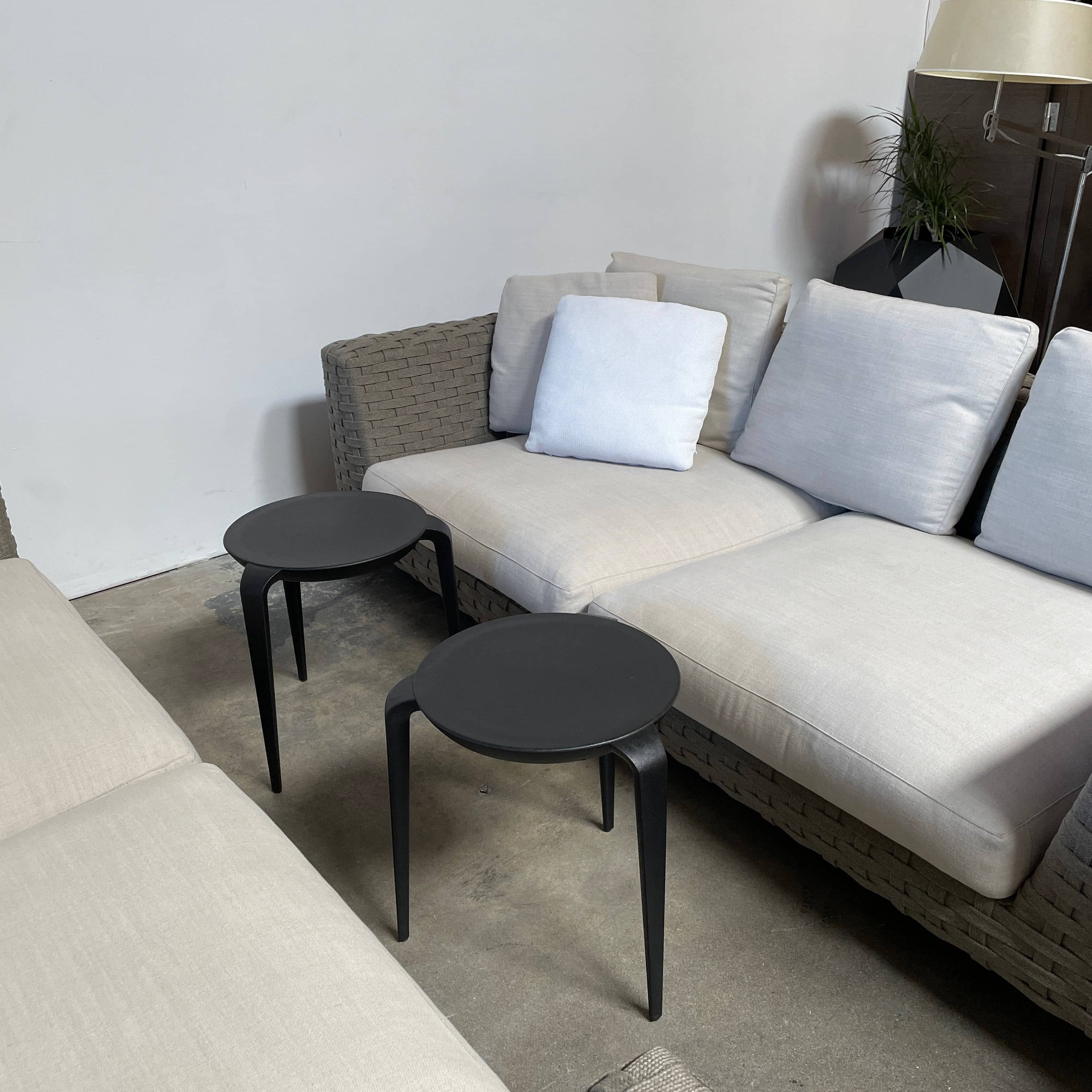 A B&B Italia Ray Outdoor Sofas with cushions on a white background.