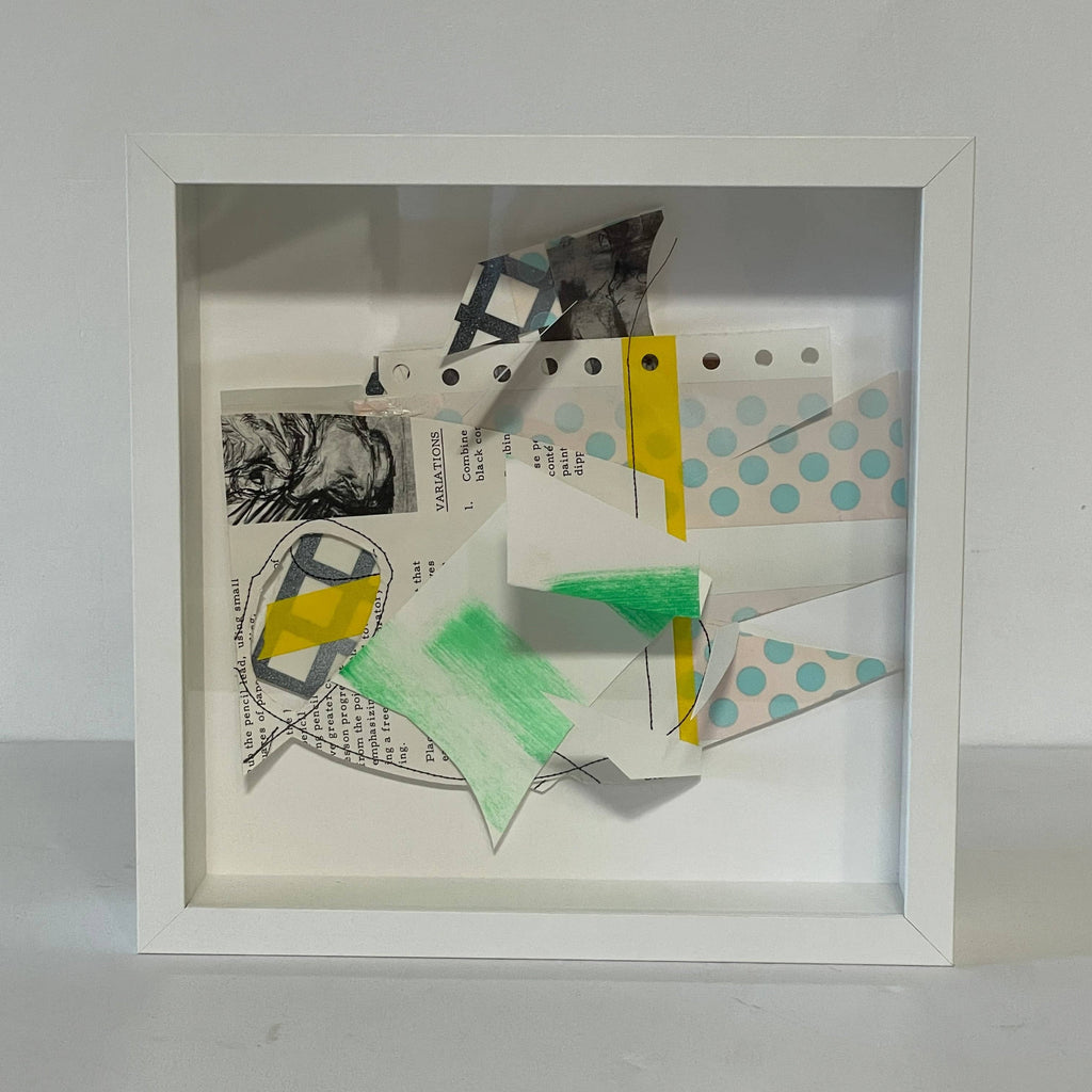 A white frame with Collage: Untitled 2 papers in it, Allison Caesar.