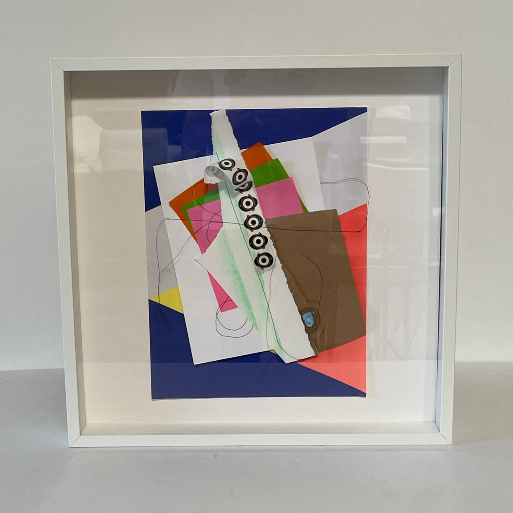 A framed Collage: Untitled 10 by Allison Caesar with colorful pieces of paper.