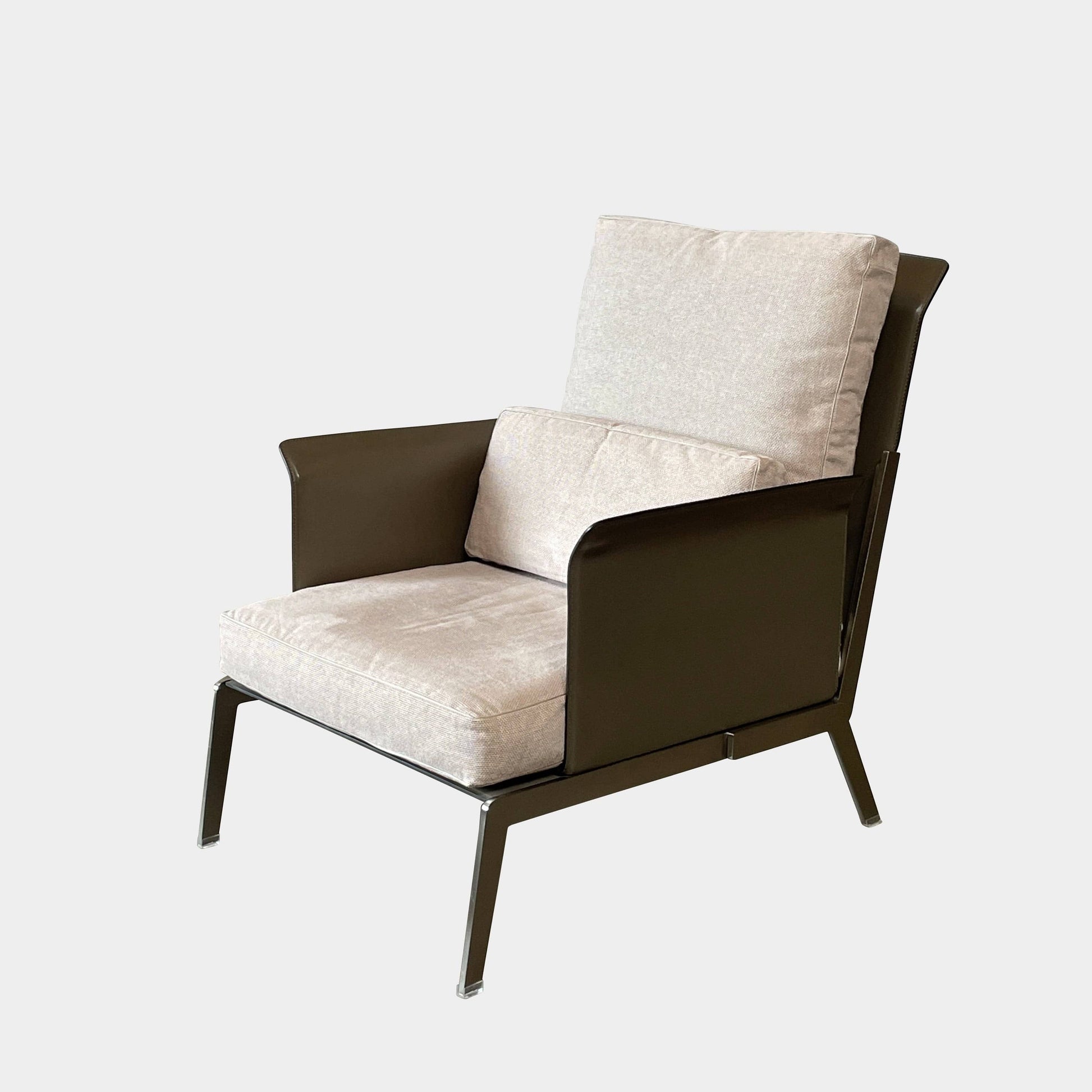 A Flexform Happy-Hour Lounge Chair with a gray cushioned seat, black metal frame, and angled legs is shown against a white background.