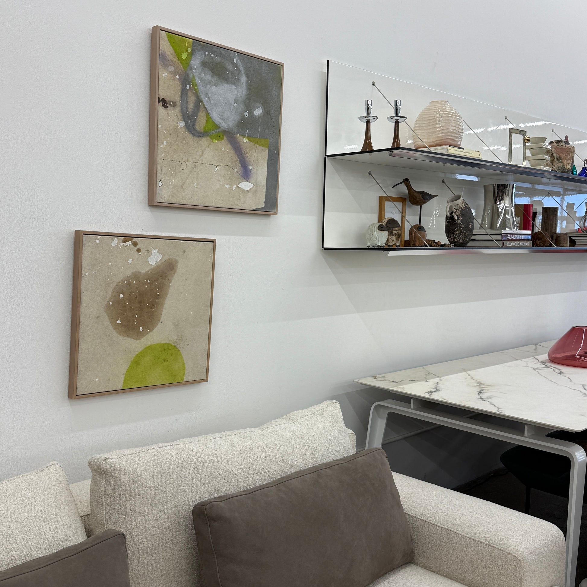 Framed Painting: Allison Caesar Mixed Media - Untitled by Artist features gray, beige, and yellow with circular forms, splatters, and dark spots on a textured background. This elegant artwork enhances any space.