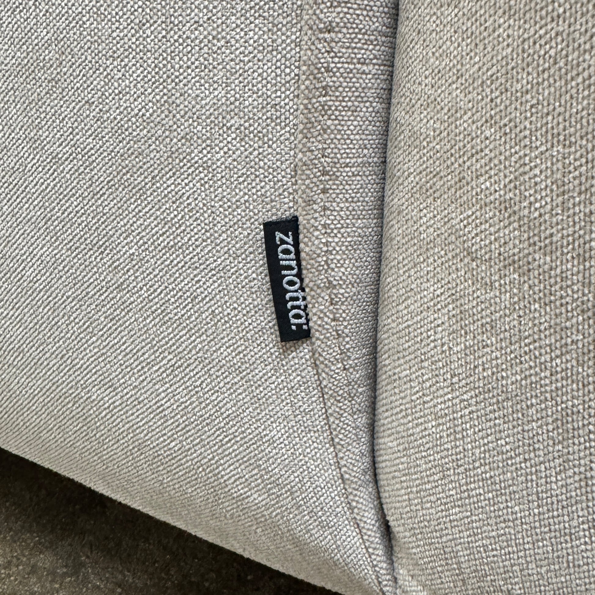 The Zanotta Pianoalto 3 Piece Sectional by Zanotta features light gray brushed cotton blend upholstery and five matching back cushions for ergonomic support, shown against a plain white background.