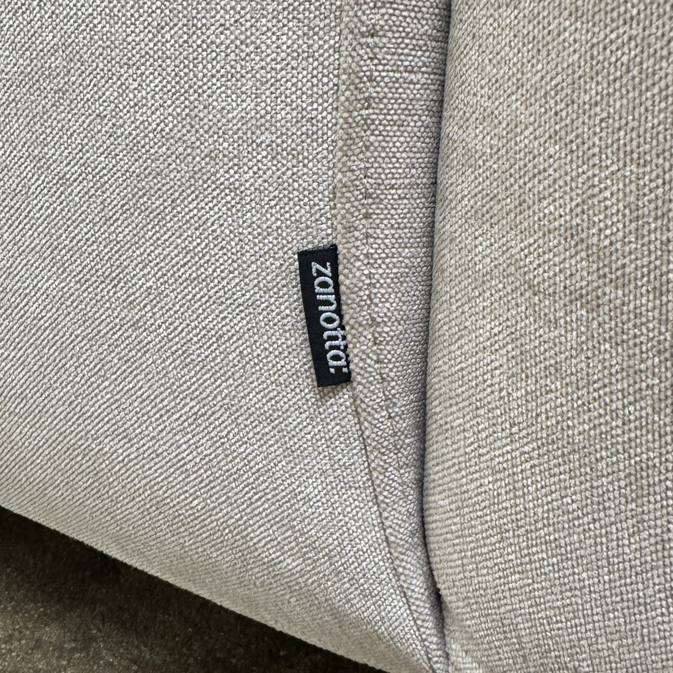 The Zanotta Pianoalto 3 Piece Sectional by Zanotta features light gray brushed cotton blend upholstery and five matching back cushions for ergonomic support, shown against a plain white background.
