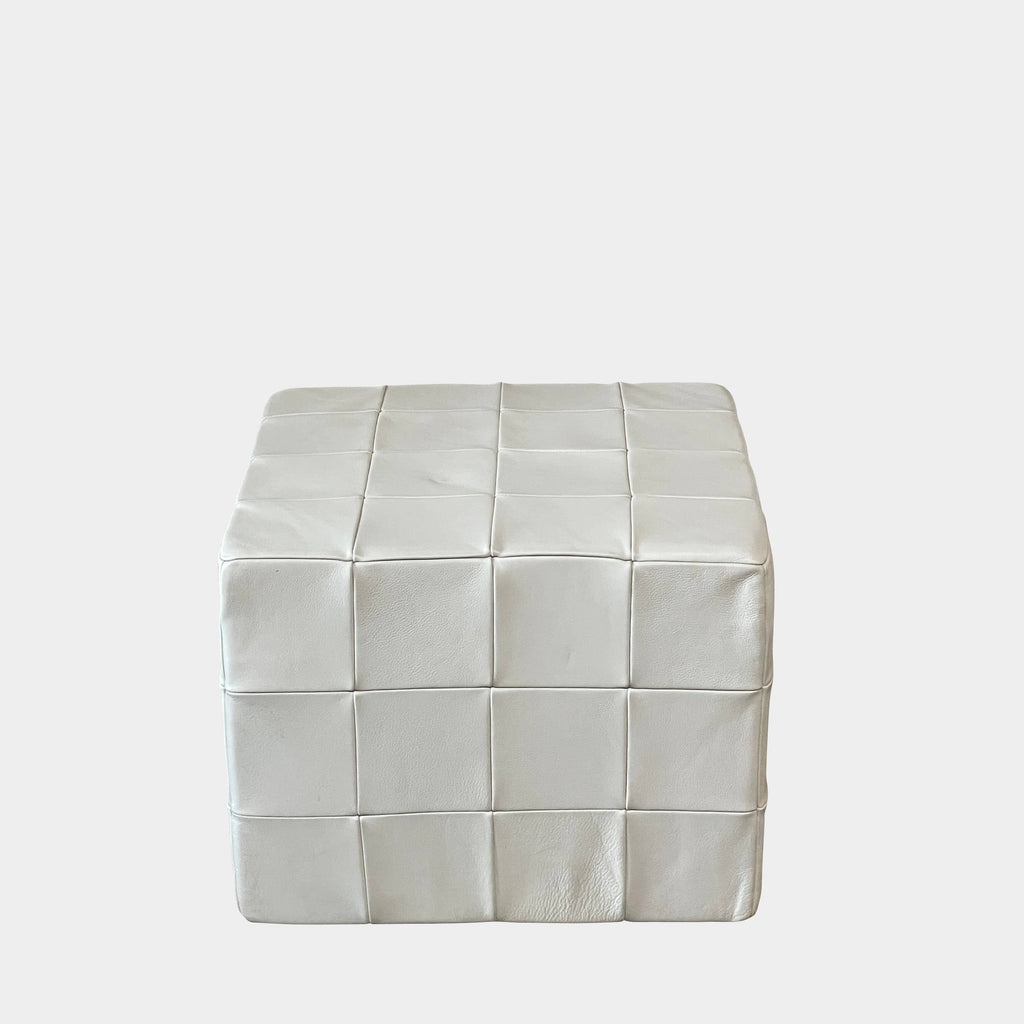 A De Sede Patchwork Leather Pouf on a white background.