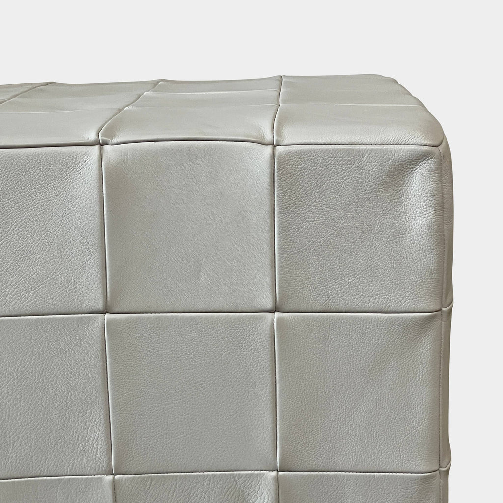 A De Sede Patchwork Leather Pouf on a white background.
