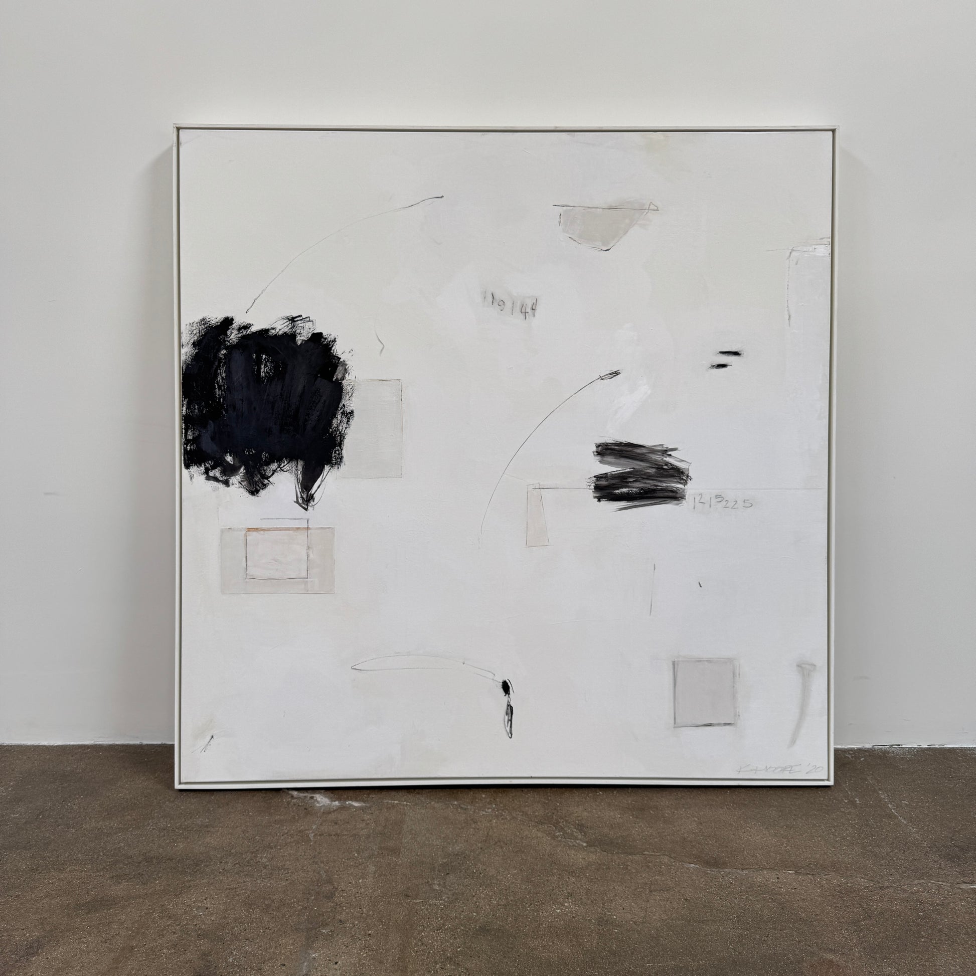 Painting: Abstract by Kimberly Moore from Artist features bold black brush strokes, faint geometric shapes, and subtle lines in black and white, leaning against a white wall on a concrete floor.