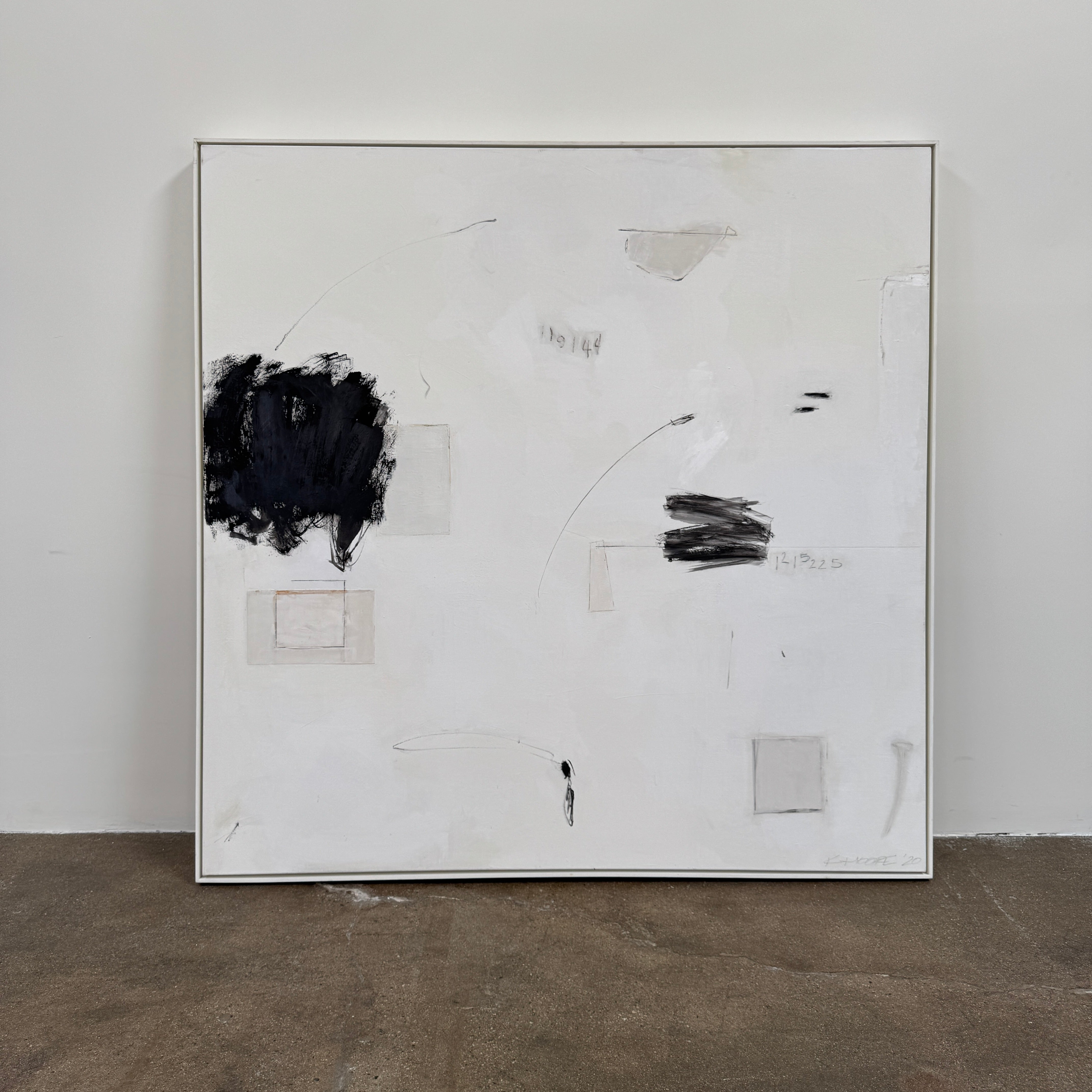 Painting: Abstract by Kimberly Moore from Artist features bold black brush strokes, faint geometric shapes, and subtle lines in black and white, leaning against a white wall on a concrete floor.