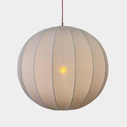 A Penta Balloon Light hanging lamp on a white wall.