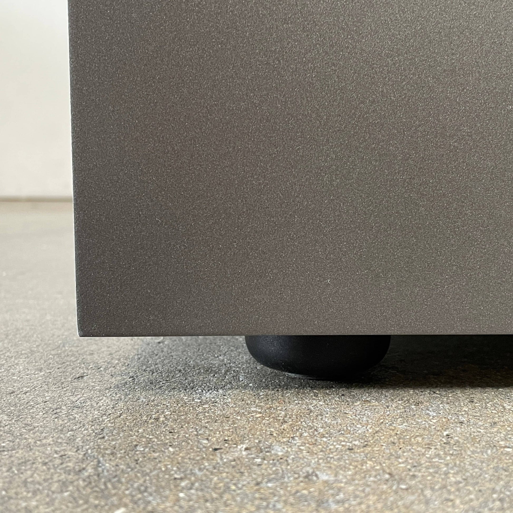 Two identical B&B Italia Surface Nightstands by B&B Italia, in a chic white finish with black trim, each featuring two drawers and open shelving in the middle. These modern pieces are perfect for any contemporary bedroom furniture arrangement.