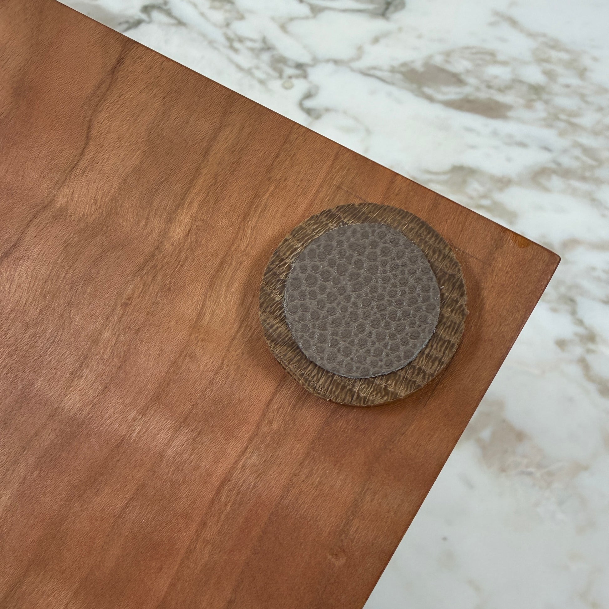 The Mike Fair Jewelry Box / Cigar Box by Mike Fair Custom Furnishings is a rectangular cherry wood box with a smooth finish and a curved, dark handle on the lid, displayed against a plain white background.