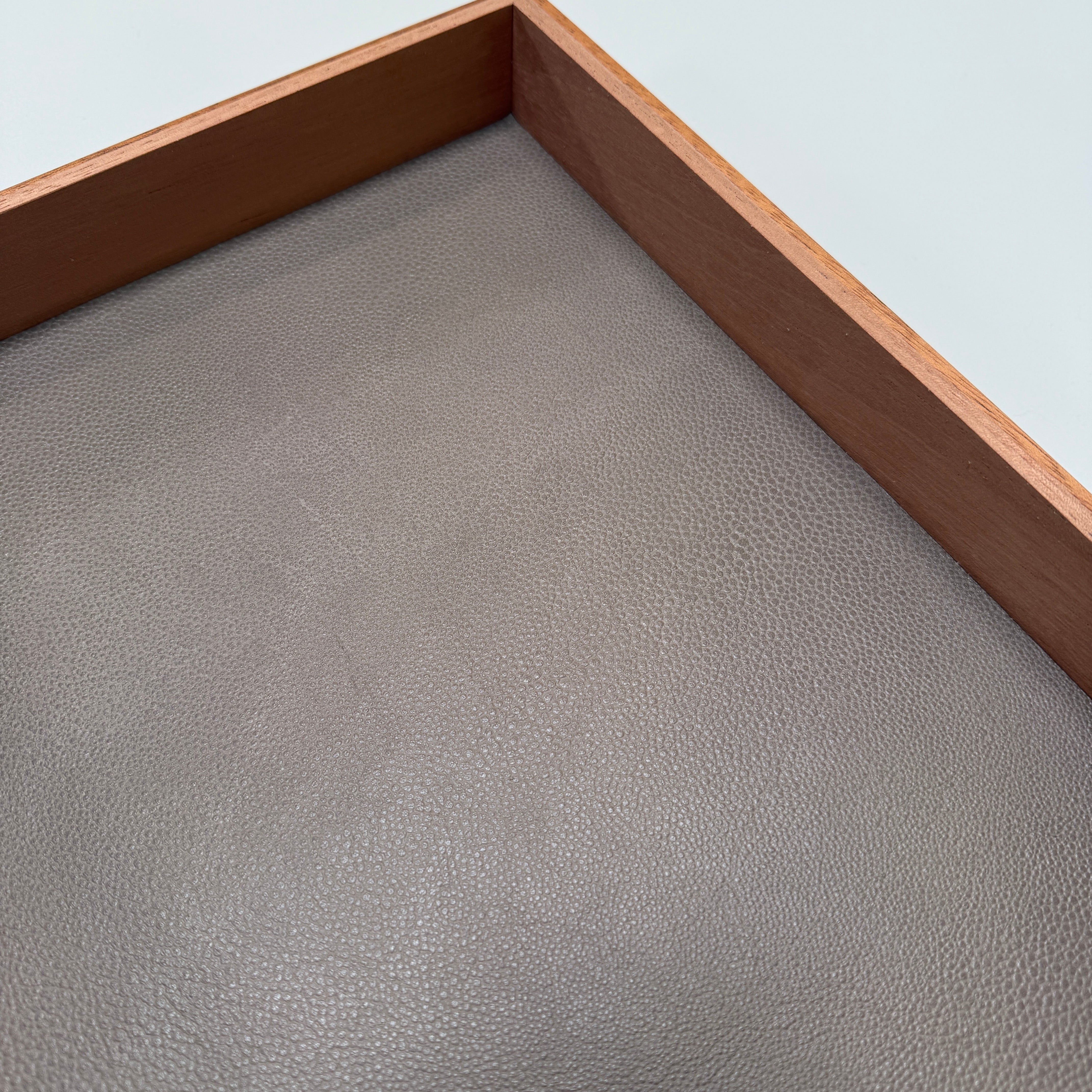 The Mike Fair Jewelry / Cigar Box by Mike Fair Custom Furnishings is a rectangular handcrafted box with a lid featuring a curved cutout and two circular holes, displayed against a plain white background.