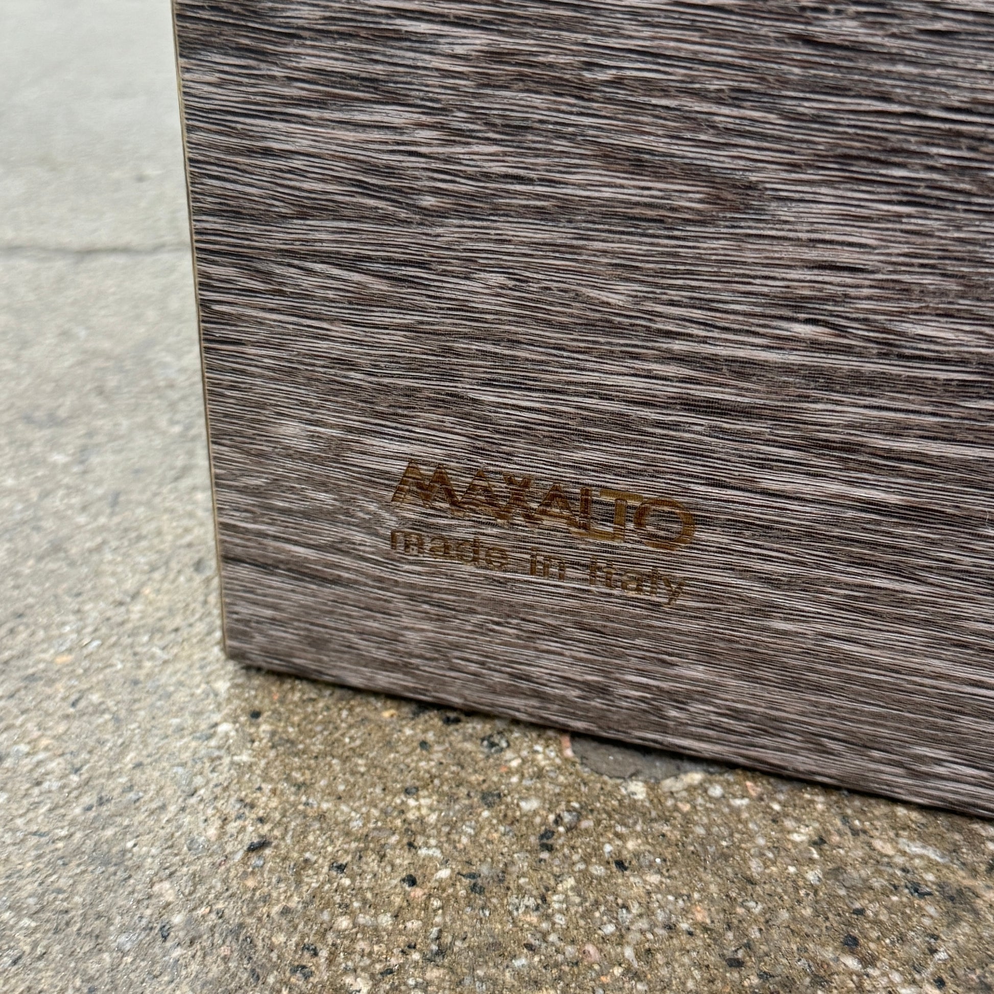 The Maxalto Arke Side Table by Maxalto is a square Sucupira wood accent table with a minimalist design, thick legs, and an open space beneath, shown against a plain white background.