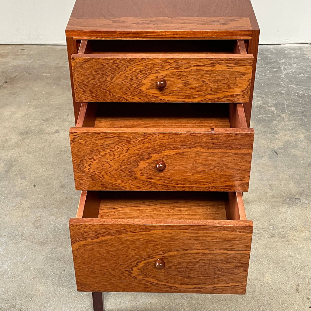 A Three Legged Chest with Drawers from Unknown brand.