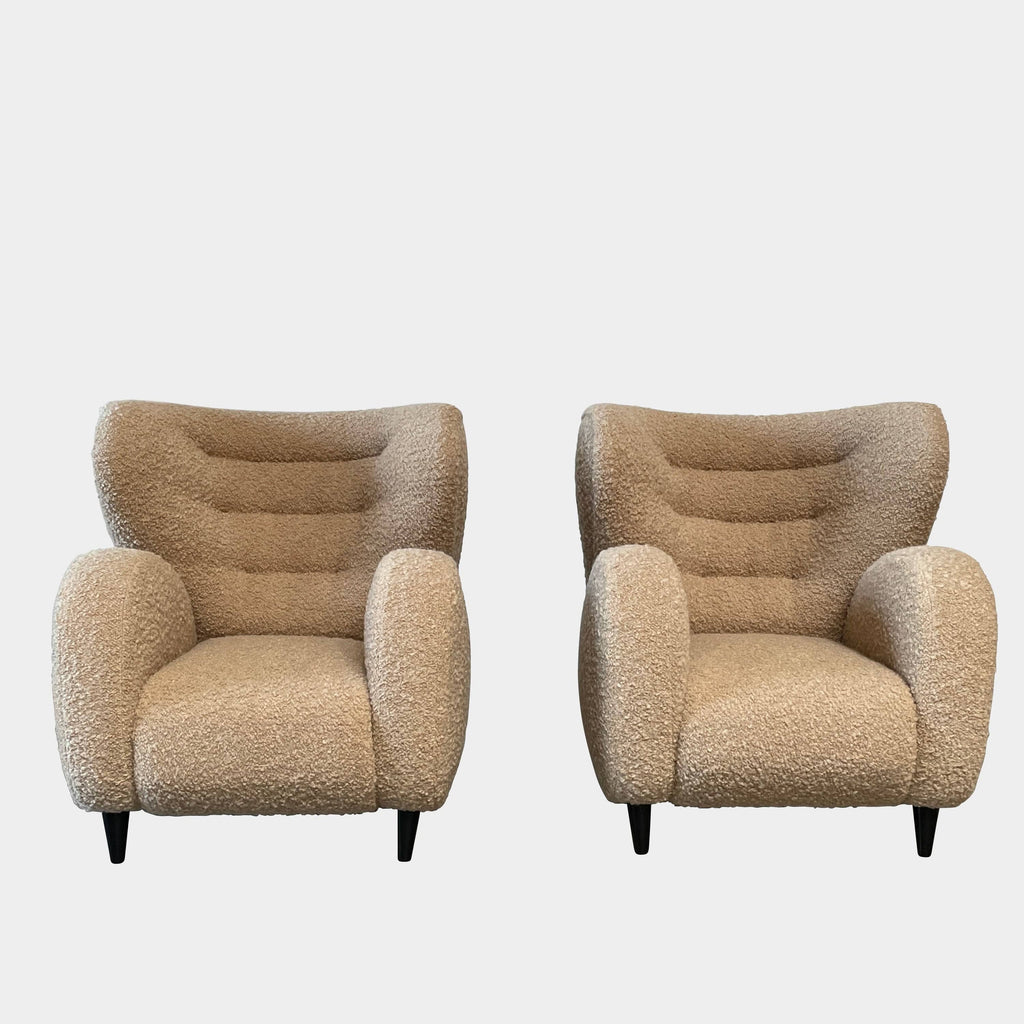 A pair of Pierre Augustin Rose Le Minotaure Armchairs on a white background by Pierre Augustin Rose.
