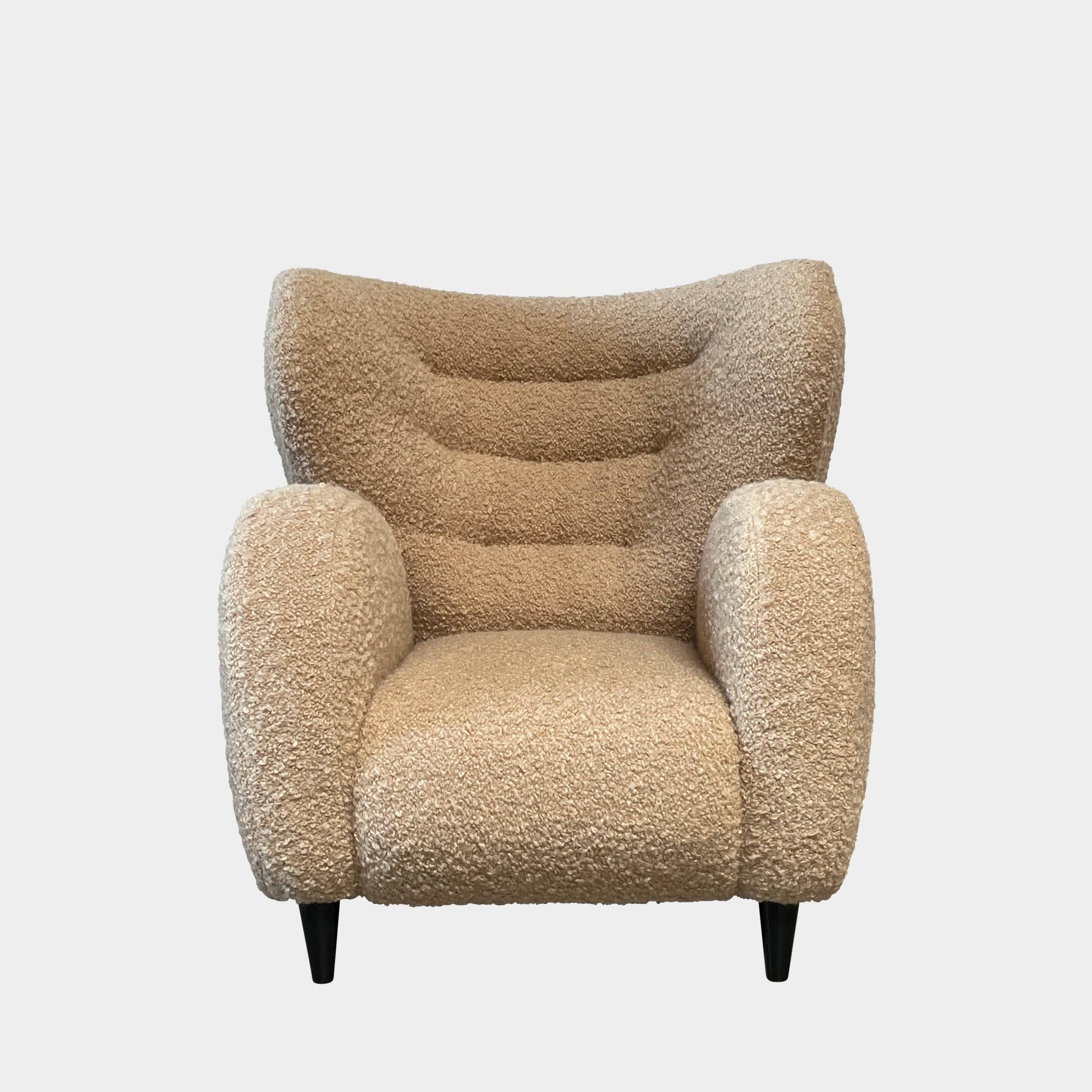 A pair of Pierre Augustin Rose Le Minotaure Armchairs on a white background by Pierre Augustin Rose.