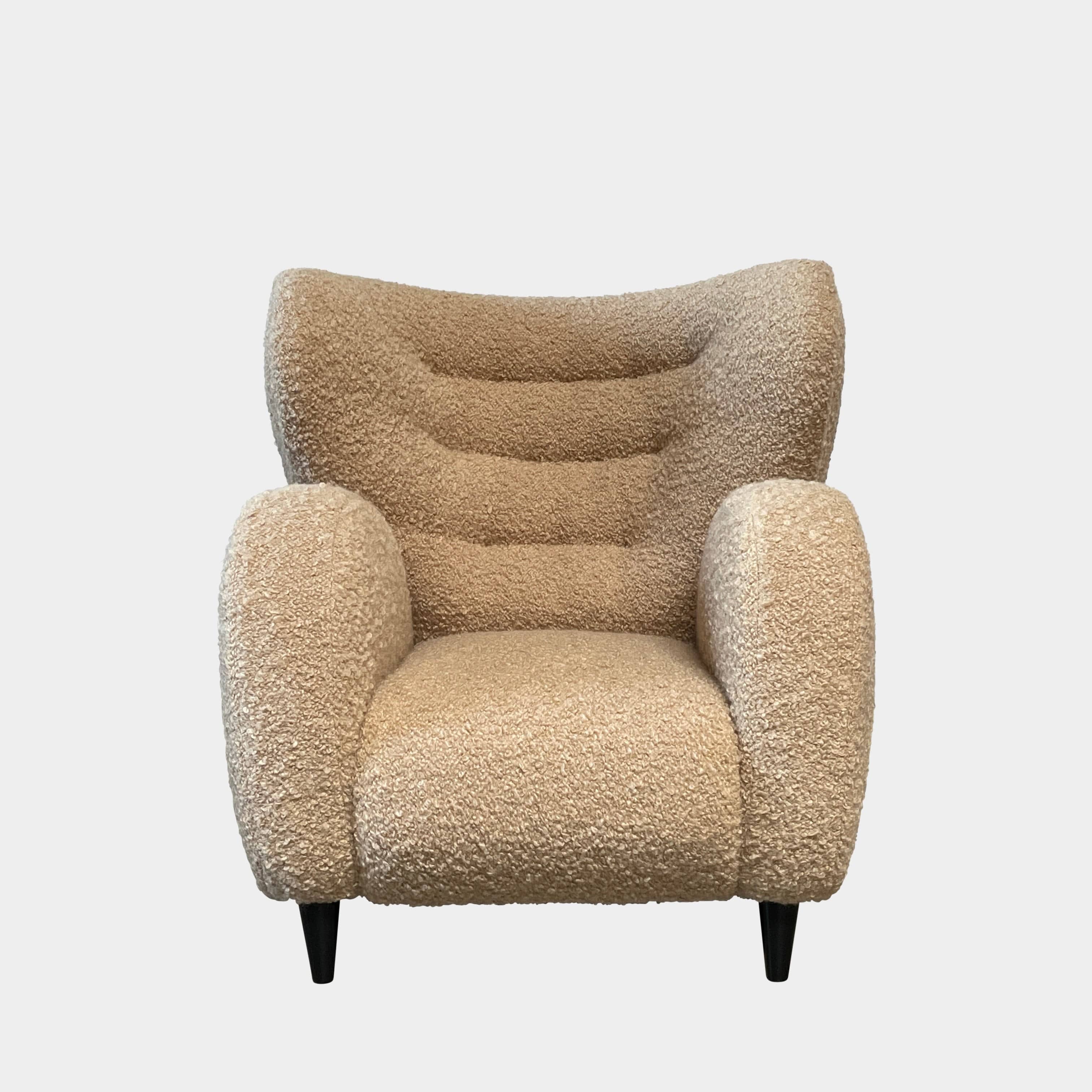 A pair of Pierre Augustin Rose Le Minotaure Armchairs on a white background by Pierre Augustin Rose.