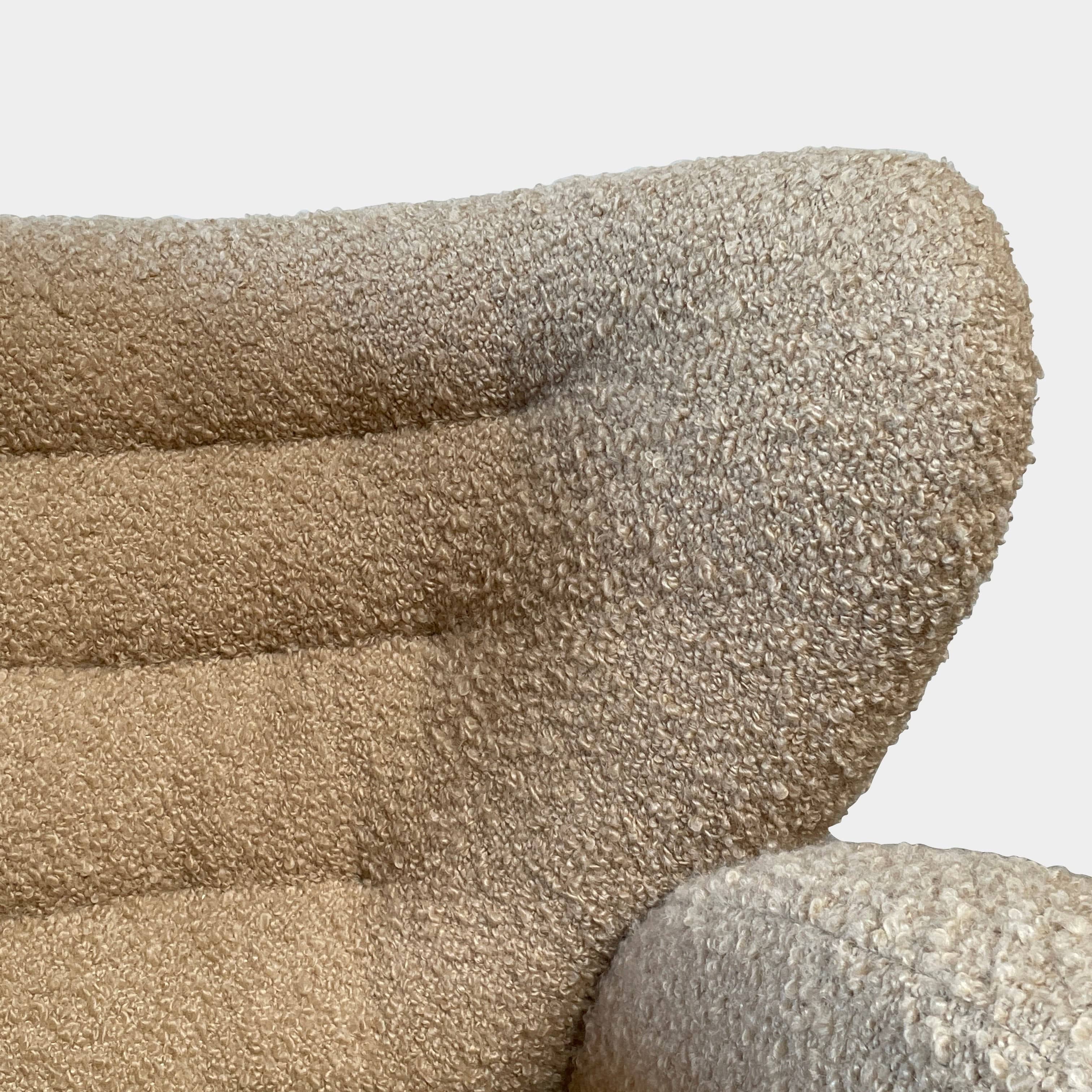 A pair of Pierre Augustin Rose Le Minotaure Armchairs on a white background by Pierre Augustin Rose.