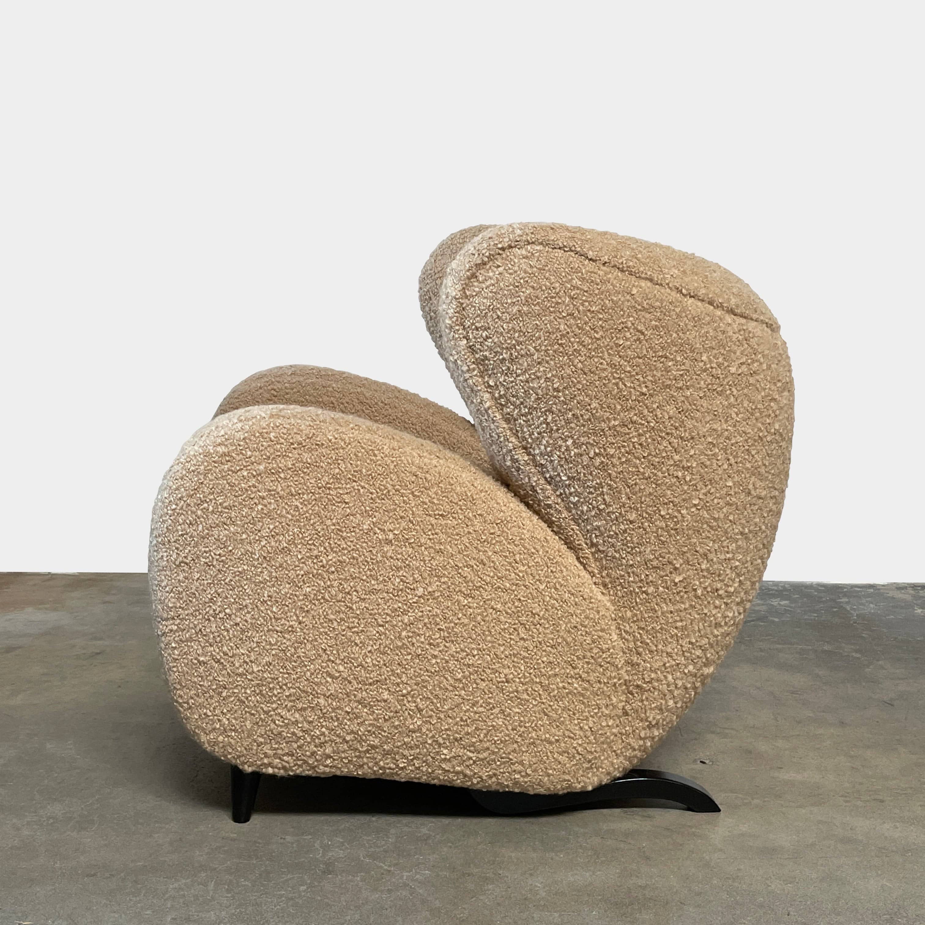 A pair of Pierre Augustin Rose Le Minotaure Armchairs on a white background by Pierre Augustin Rose.