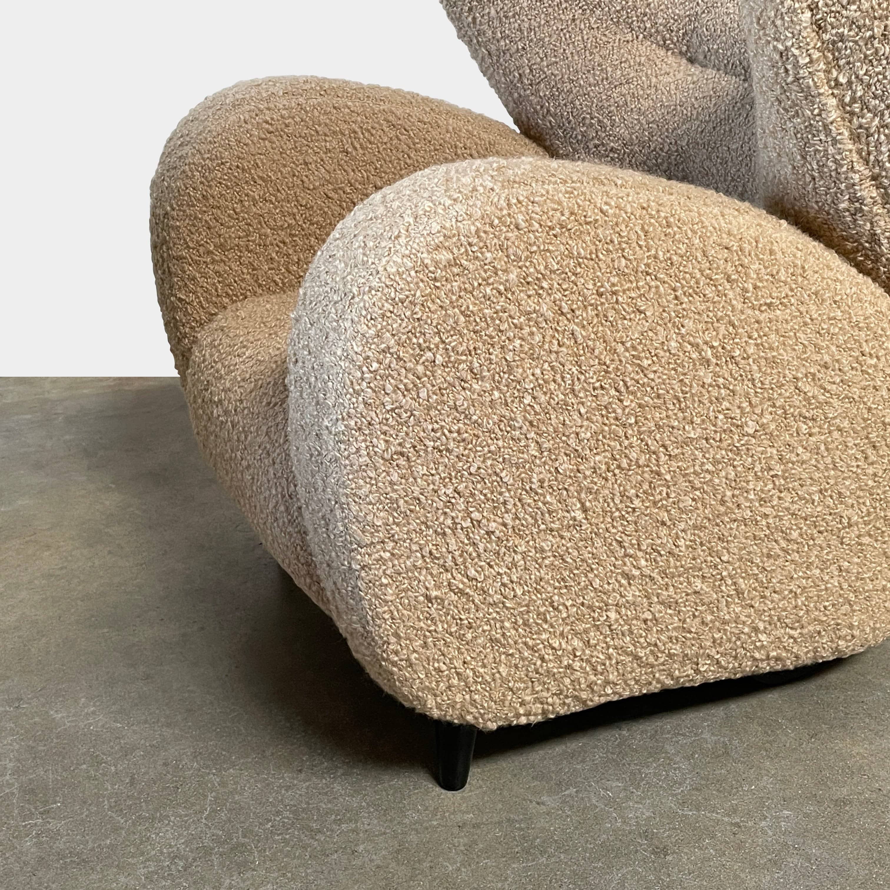 A pair of Pierre Augustin Rose Le Minotaure Armchairs on a white background by Pierre Augustin Rose.