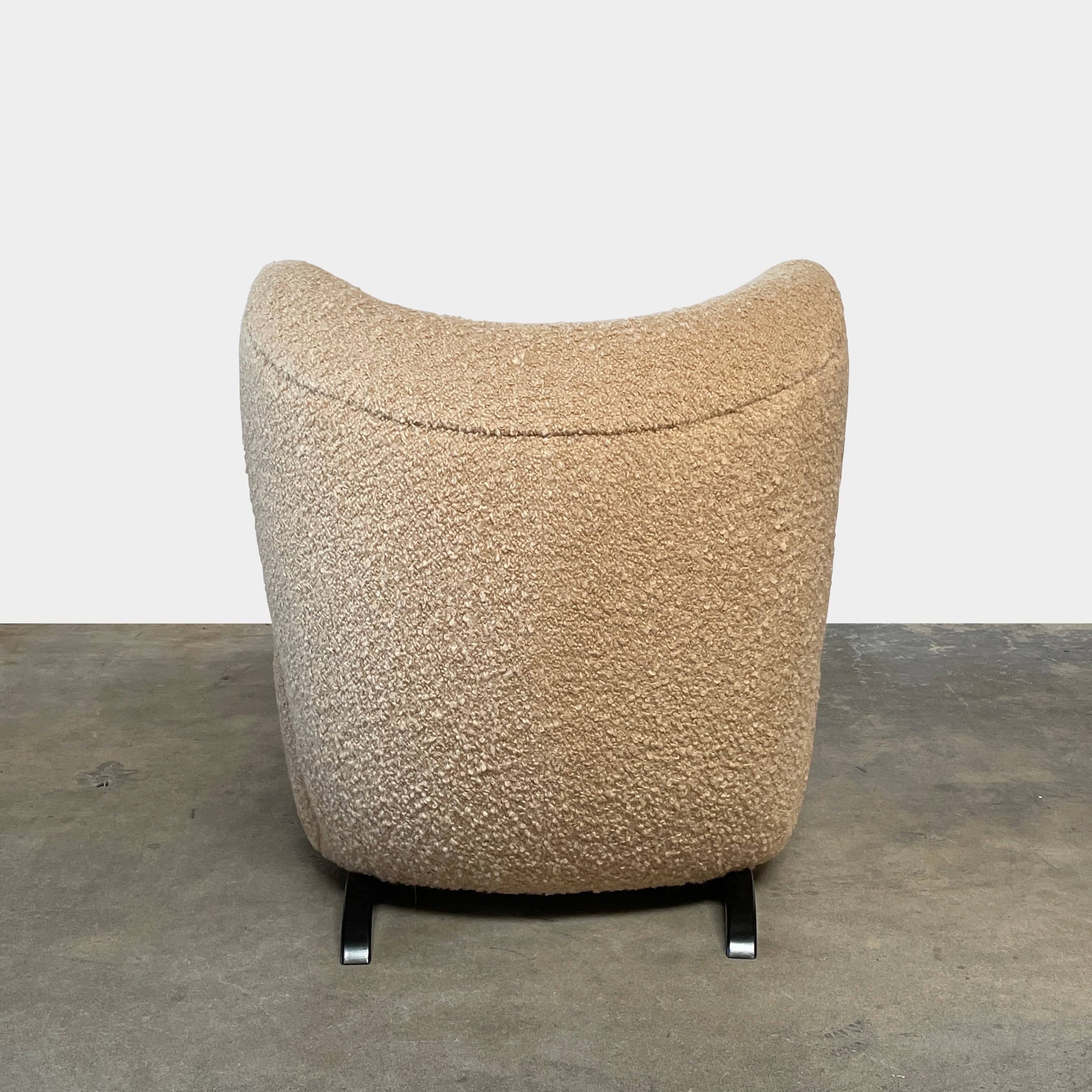 A pair of Pierre Augustin Rose Le Minotaure Armchairs on a white background by Pierre Augustin Rose.