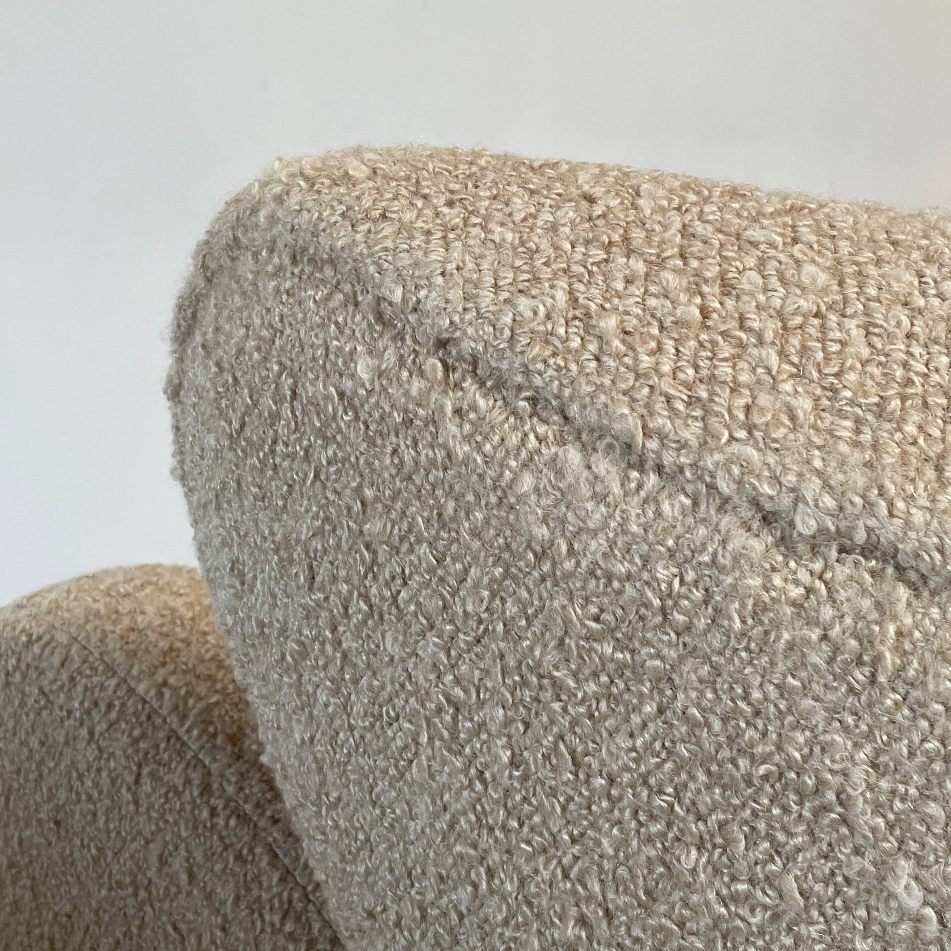 A pair of Pierre Augustin Rose Le Minotaure Armchairs on a white background by Pierre Augustin Rose.