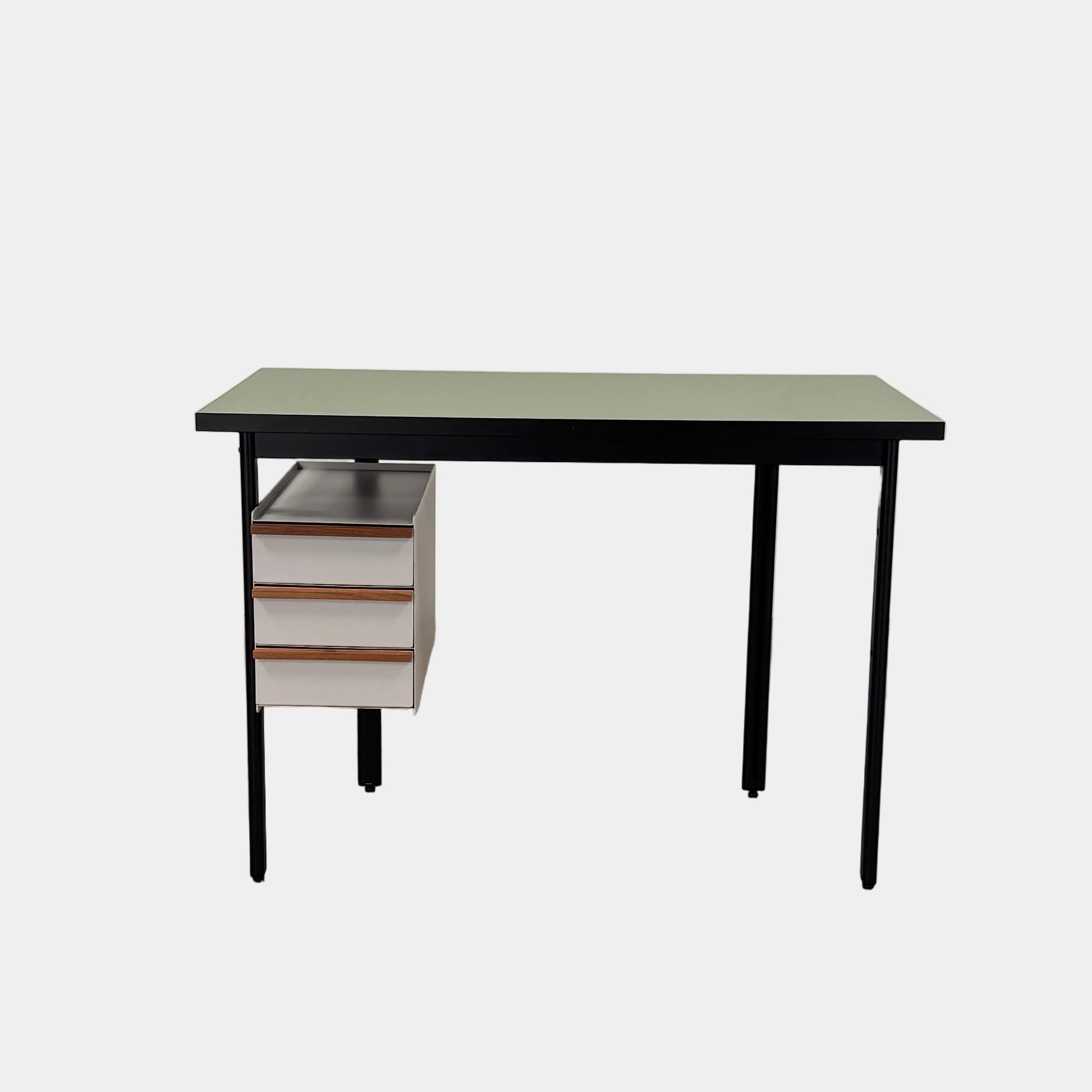 The Herman Miller Mode Desk by Herman Miller features a rectangular green tabletop, black legs, and three white drawers mounted underneath the left side—perfect as a compact desk for a minimalist workspace.