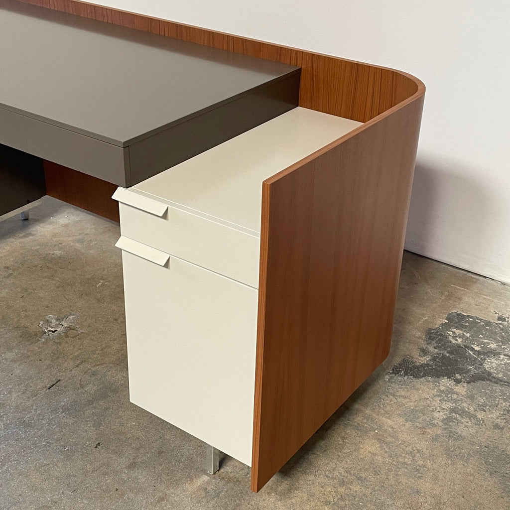 A Ligne Roset Dino Desk with drawers and a cabinet.
