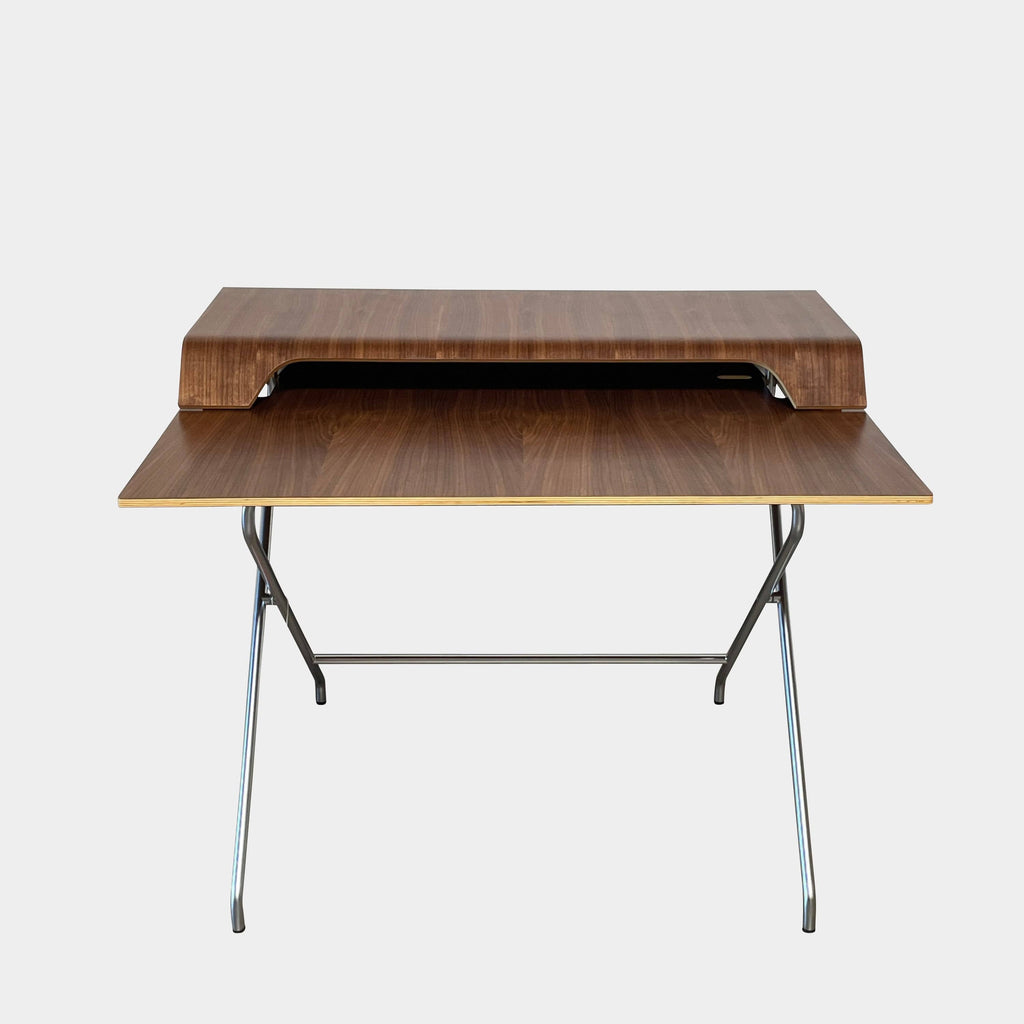 A ClassiCon Ajax Folding Writing Desk with a wooden top and metal legs made from multiplex birch-face veneer.