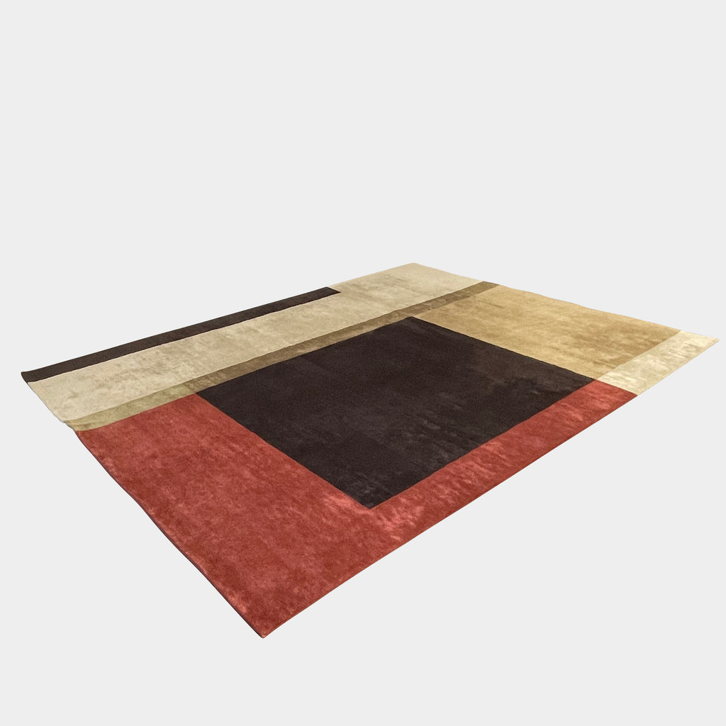 A Delinear wool rug featuring blocks of color in shades of brown, beige, and black with varying saturation and size, creating a minimalist and modern design.