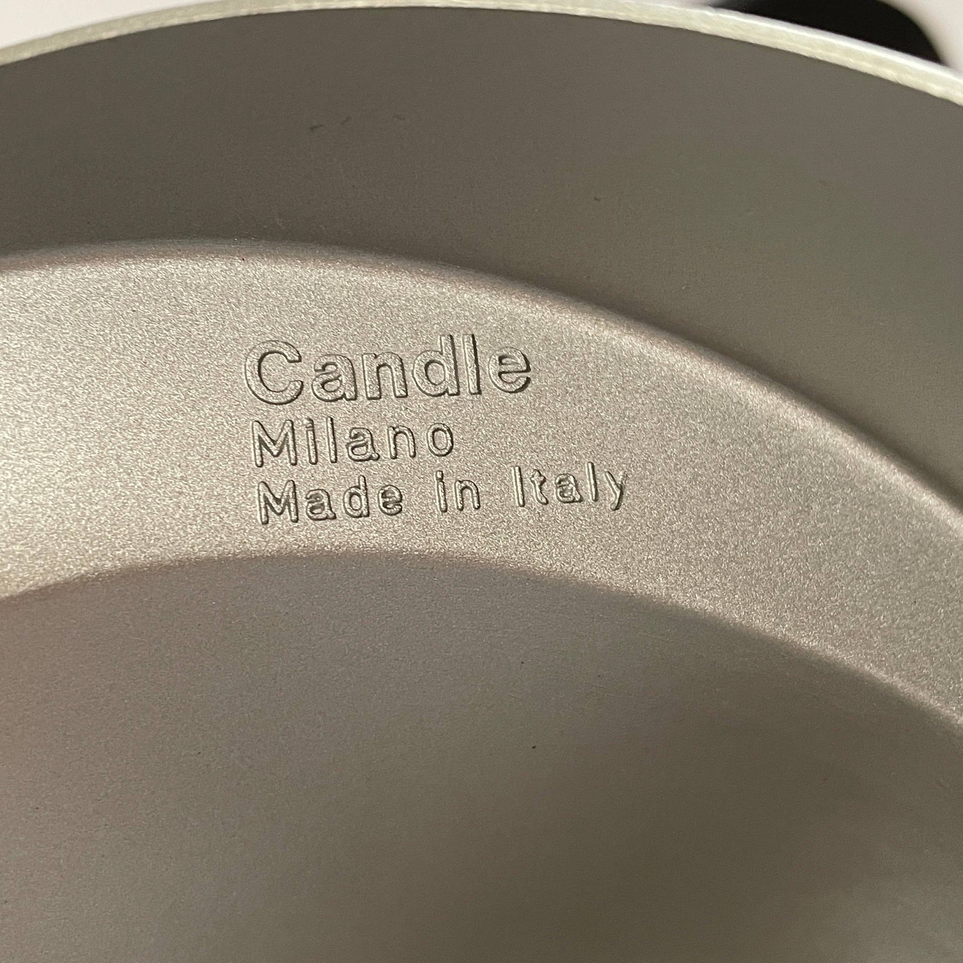 A Fontana Arte Chrono Task Lamp with a black shade and white background.