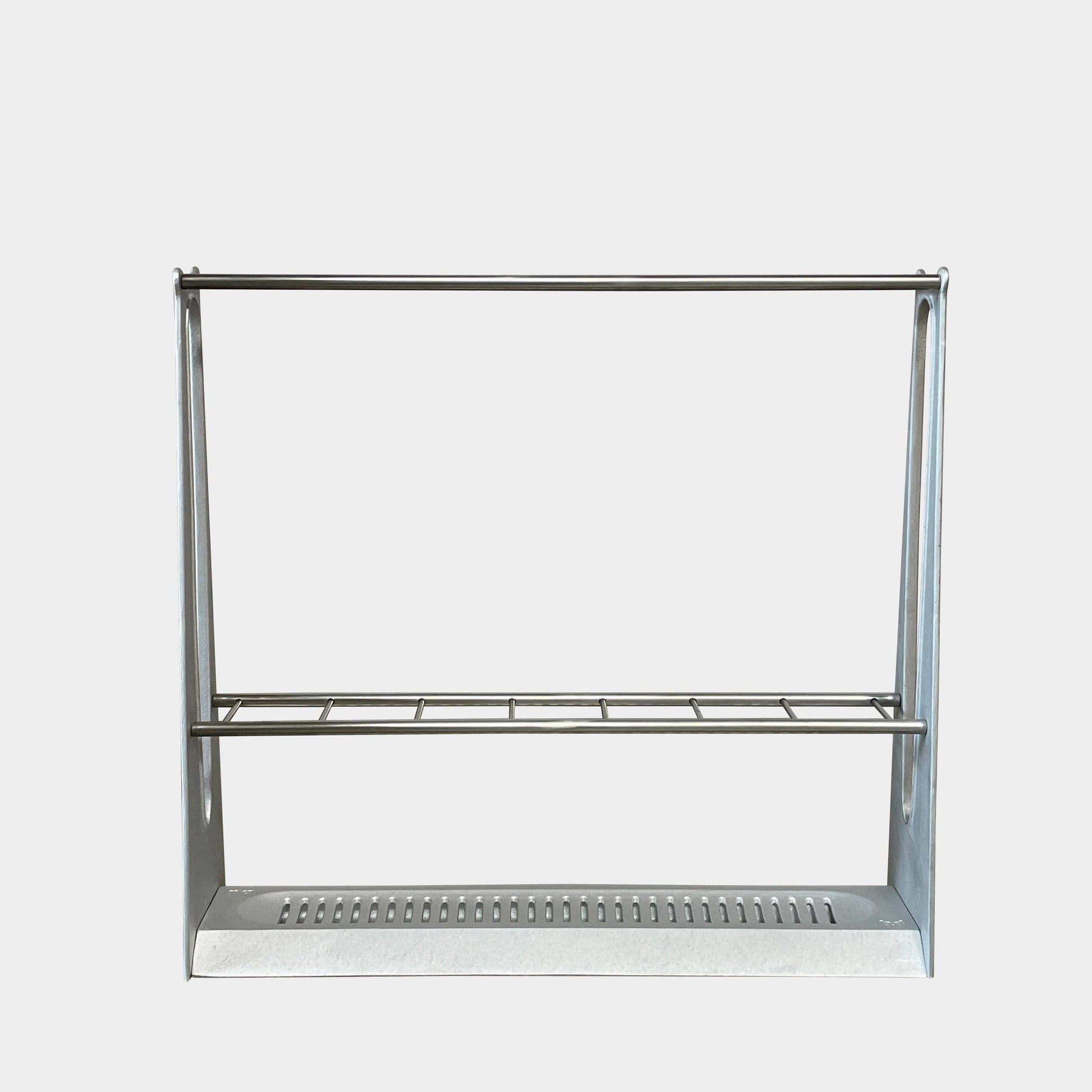 A metal rack with two shelves on it, designed for the Casa Barcelona Project and recipient of the Adi-Fad Delta Award, is the BD Barcelona Barcelonés Umbrella Stand from BD Barcelona.