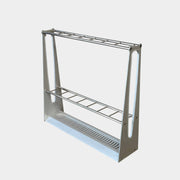 A BD Barcelona Barcelonés Umbrella Stand with two shelves on it awarded by Adi-Fad Delta Award.