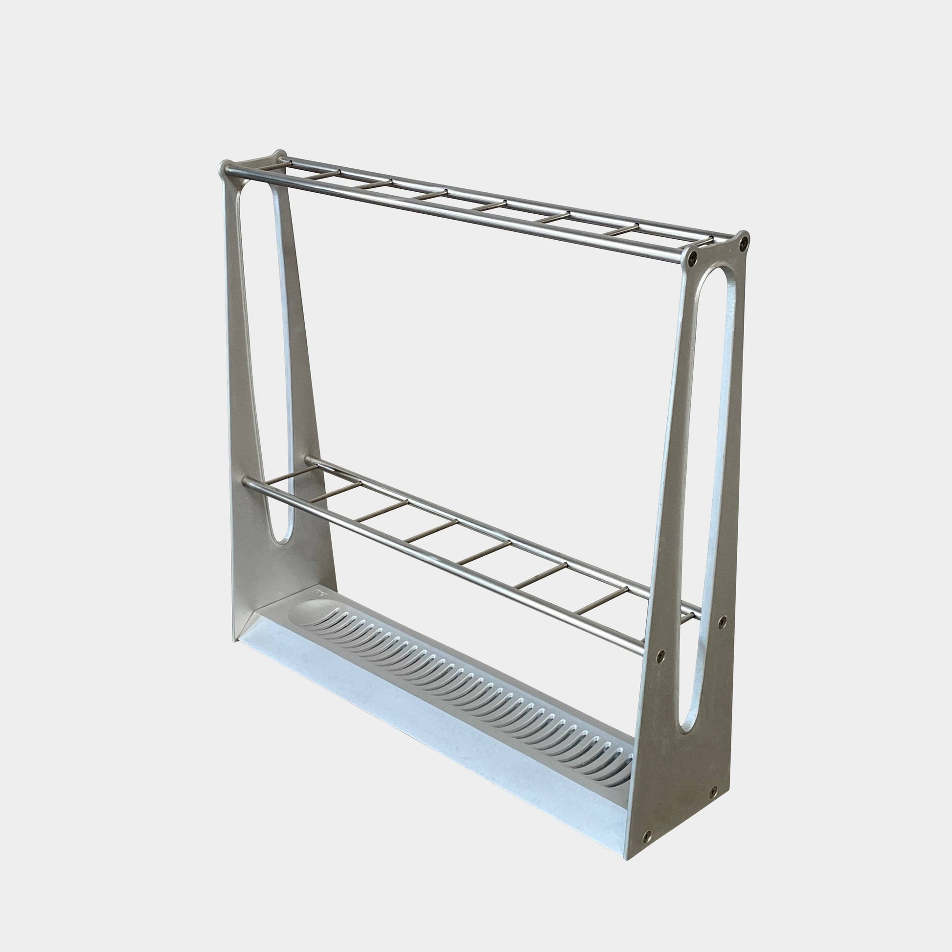 A BD Barcelona Barcelonés Umbrella Stand with two shelves on it awarded by Adi-Fad Delta Award.