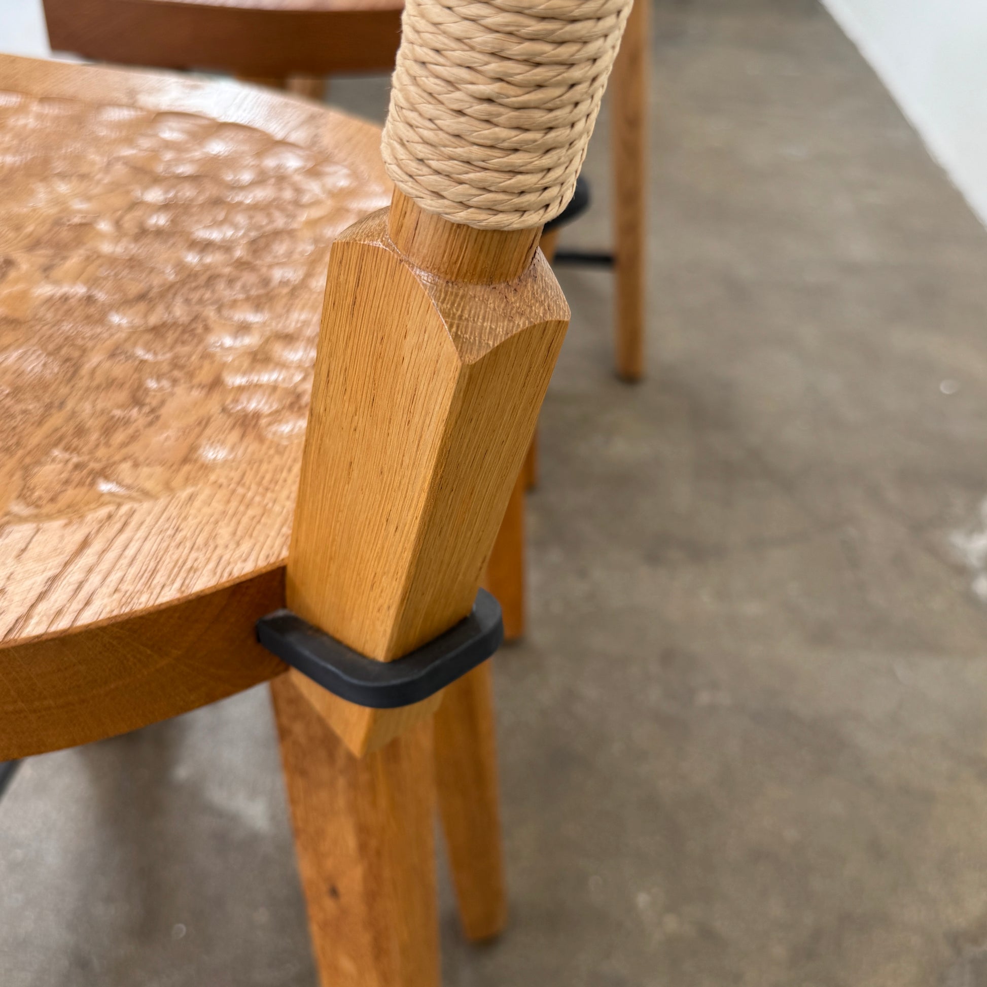 The Furniture Marolles Counter Stool Set of 3 by Furniture Marolles, featuring wooden construction and woven backrests inspired by handcrafted design, is arranged side by side against a plain white background.