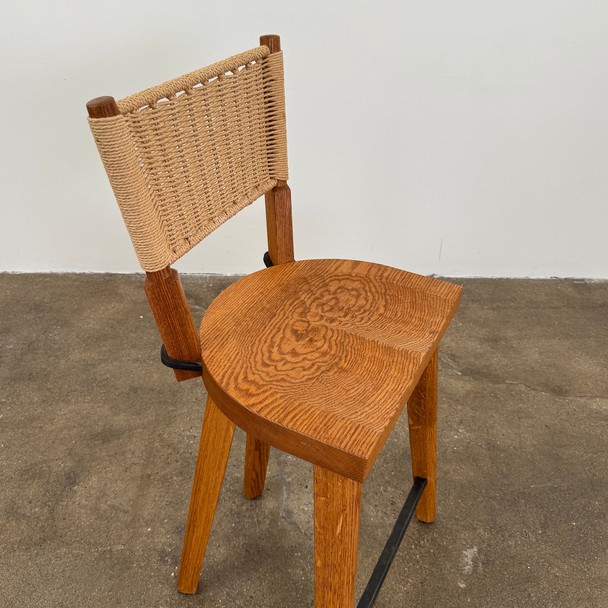 The Furniture Marolles Counter Stool Set of 3 by Furniture Marolles, featuring wooden construction and woven backrests inspired by handcrafted design, is arranged side by side against a plain white background.